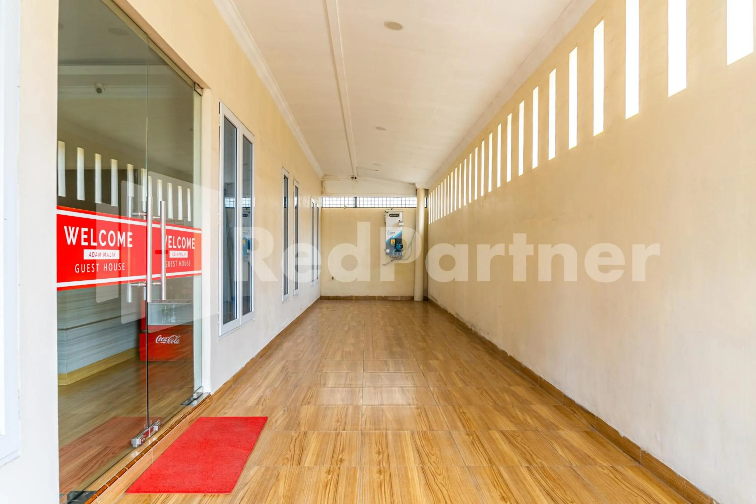 Facade/entrance in Adam Malik Guesthouse near Regale ICC Medan Mitra RedDoorz