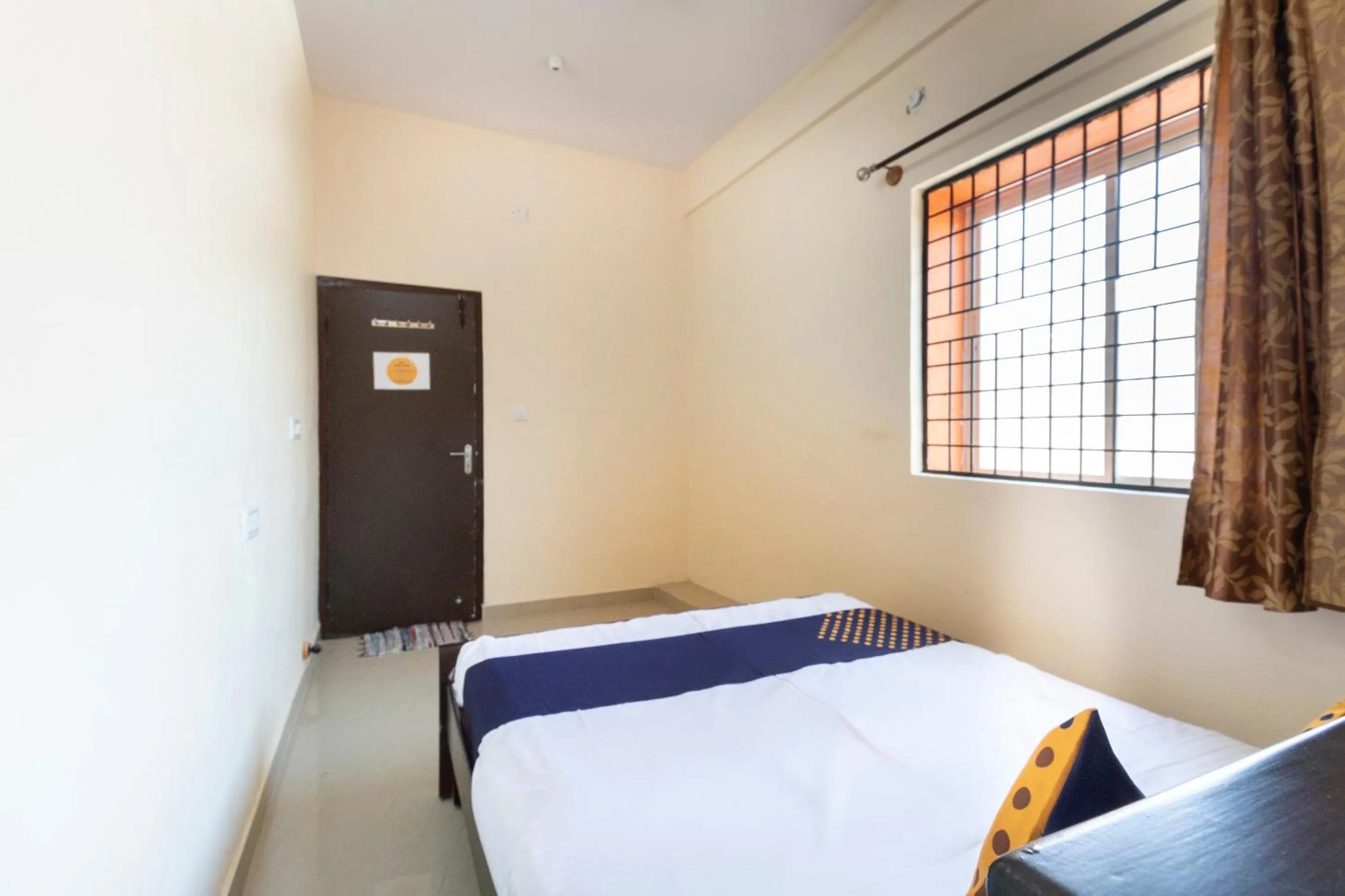 Bedroom, Bed in Hotel O SSR Lodging And Boarding