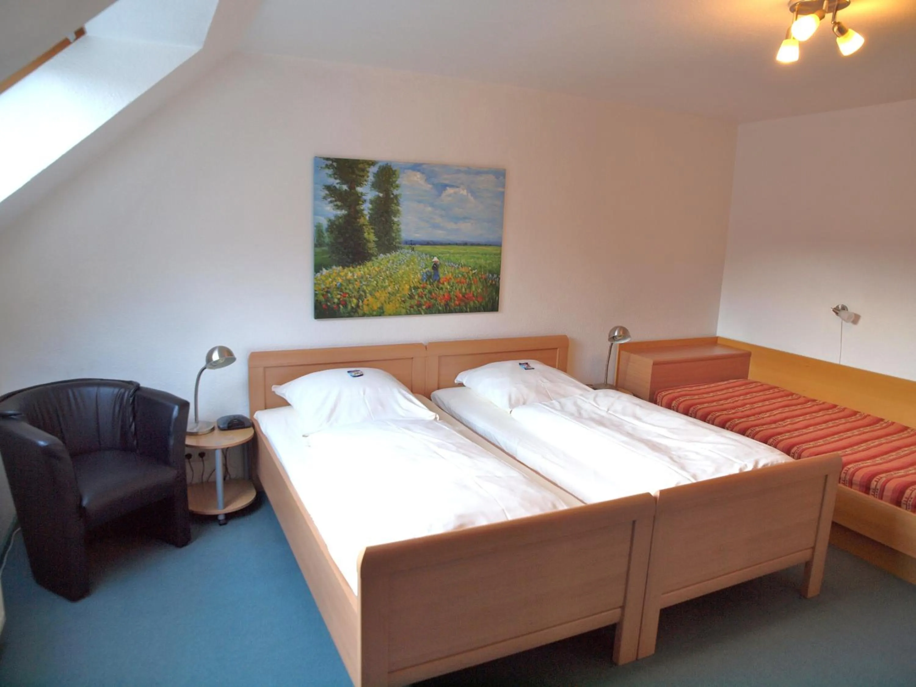 Photo of the whole room, Bed in Gästehaus Schlossgarten