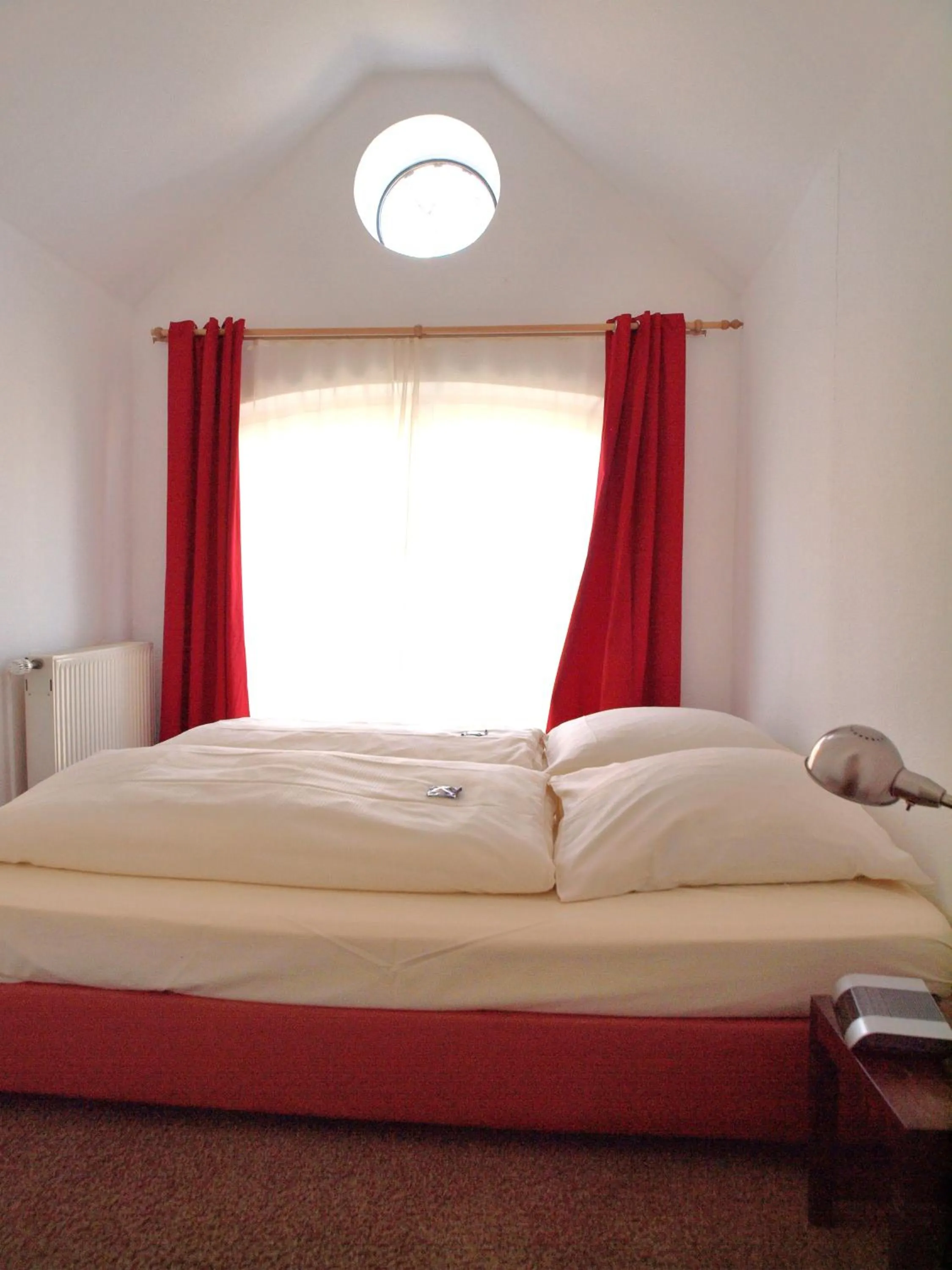 Bed in Gästehaus Schlossgarten