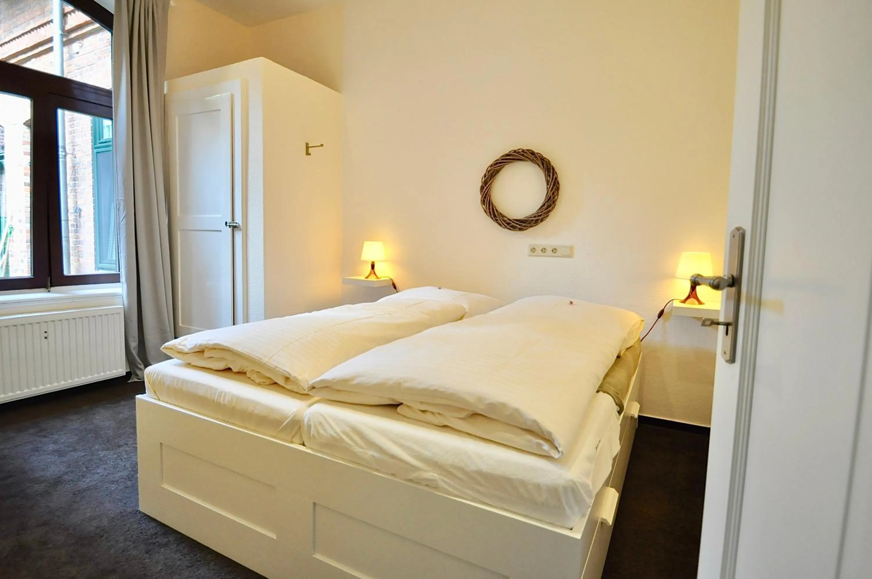 Bed in Gästehaus Schlossgarten