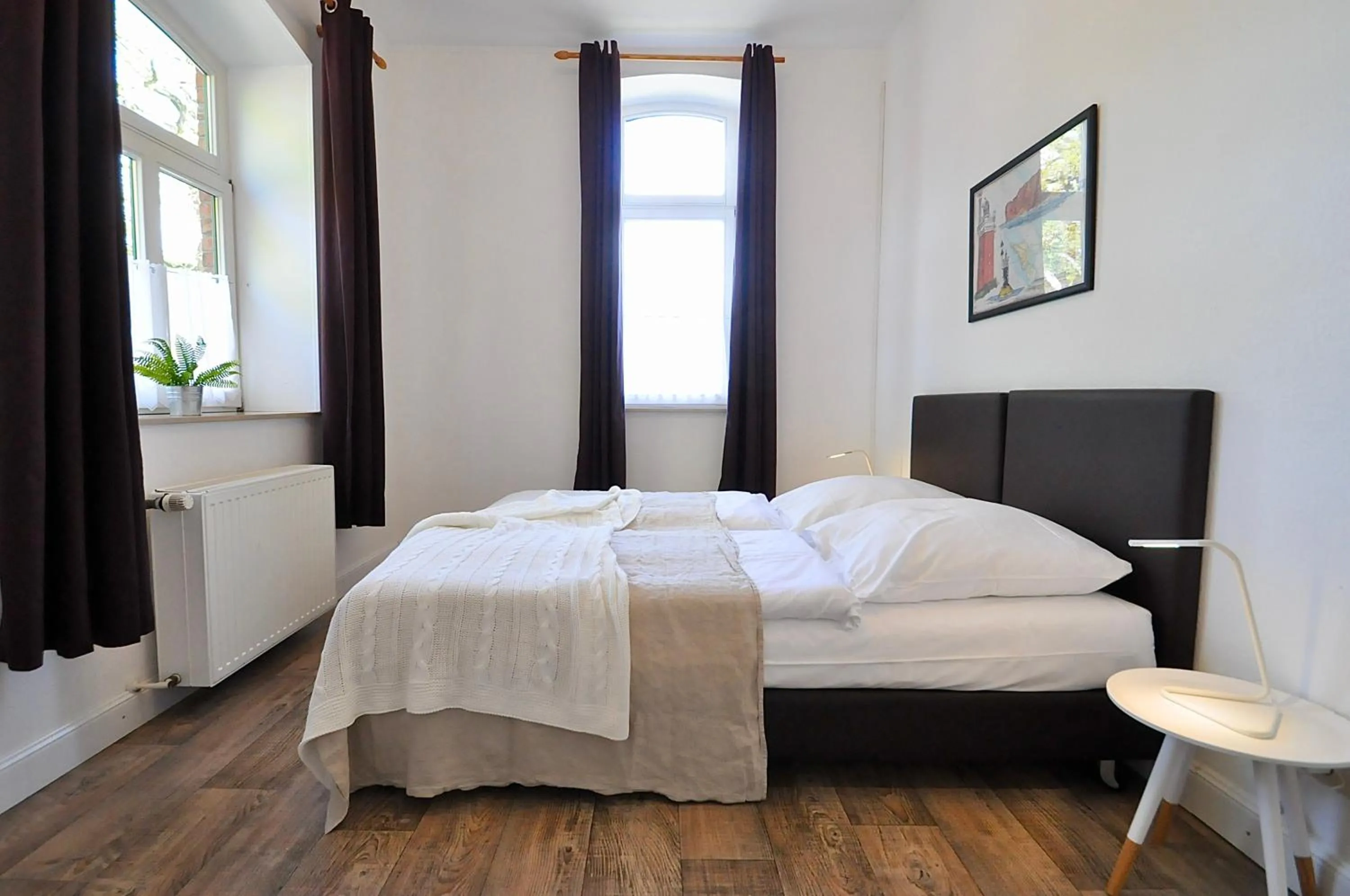 Bed in Gästehaus Schlossgarten