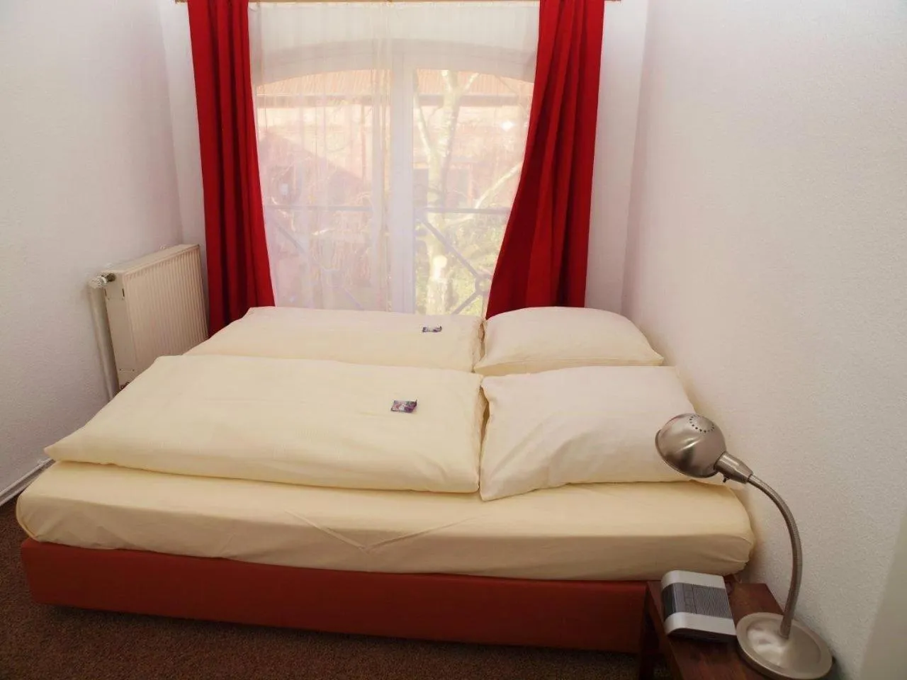 Bed in Gästehaus Schlossgarten