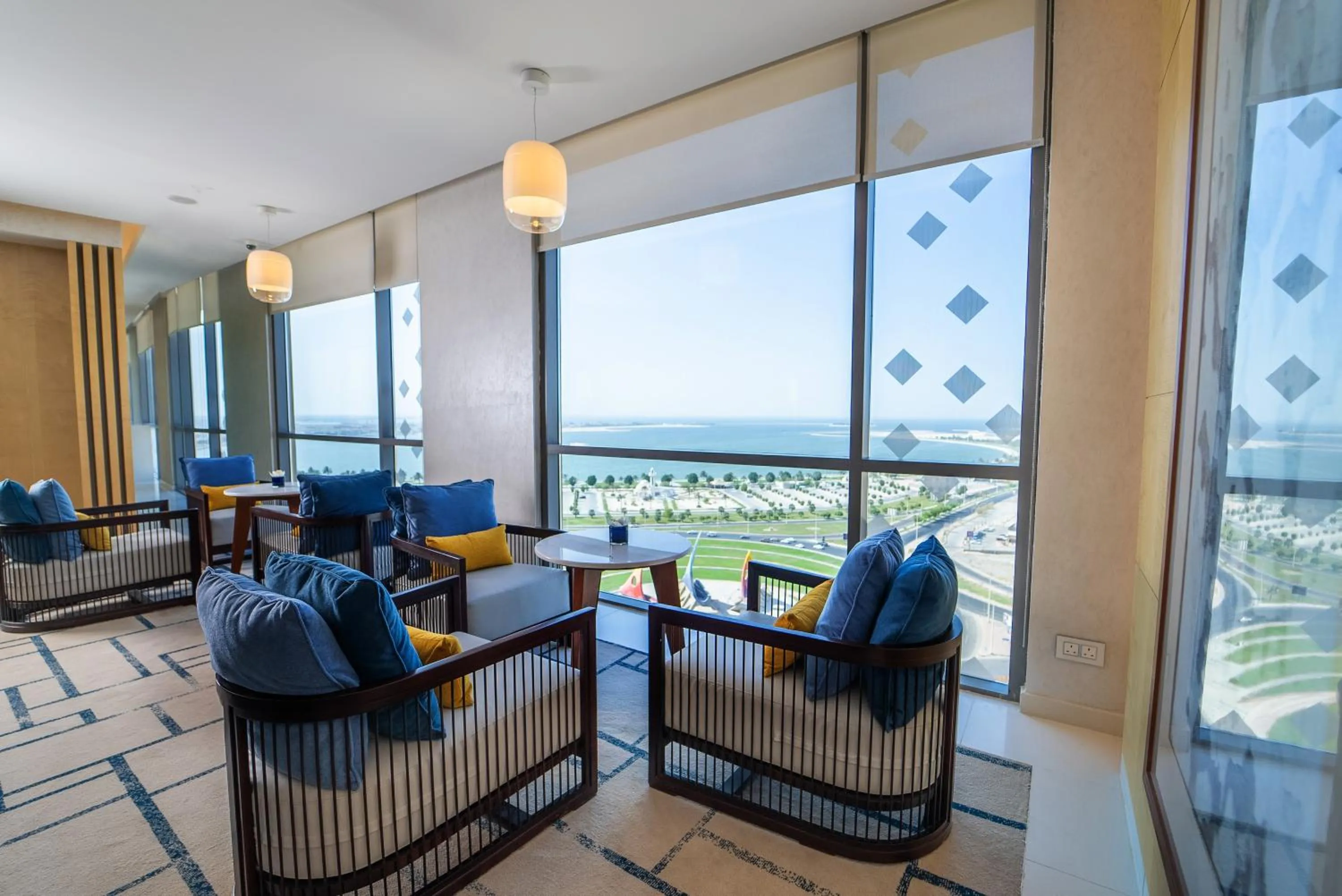 Communal lounge/ TV room in Dana Rayhaan by Rotana