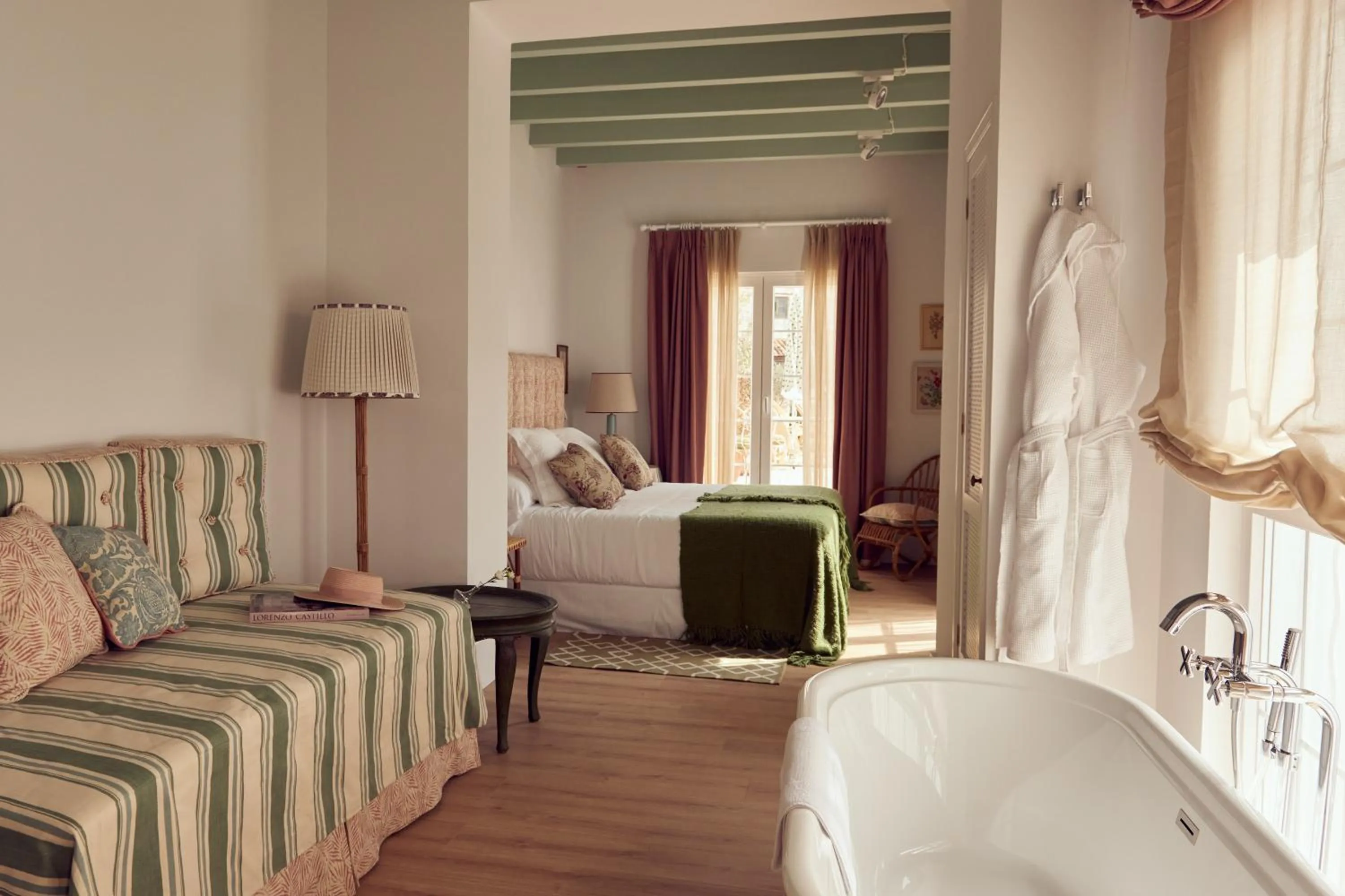 Living room, Bed in Cristine Bedfor Mahon Boutique Hotel