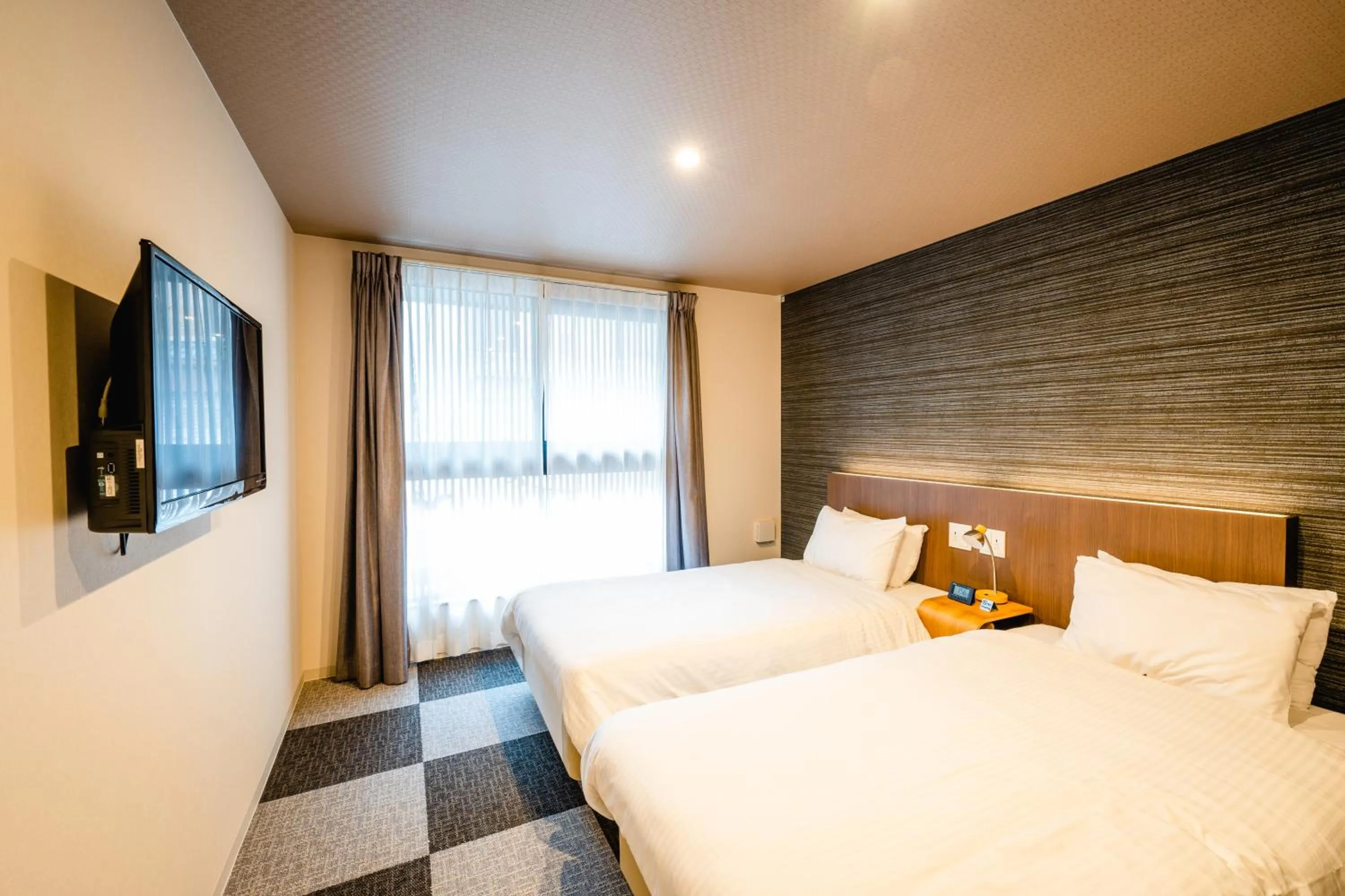 Bed in HOTEL THE POINT Kiyomizu Gojo