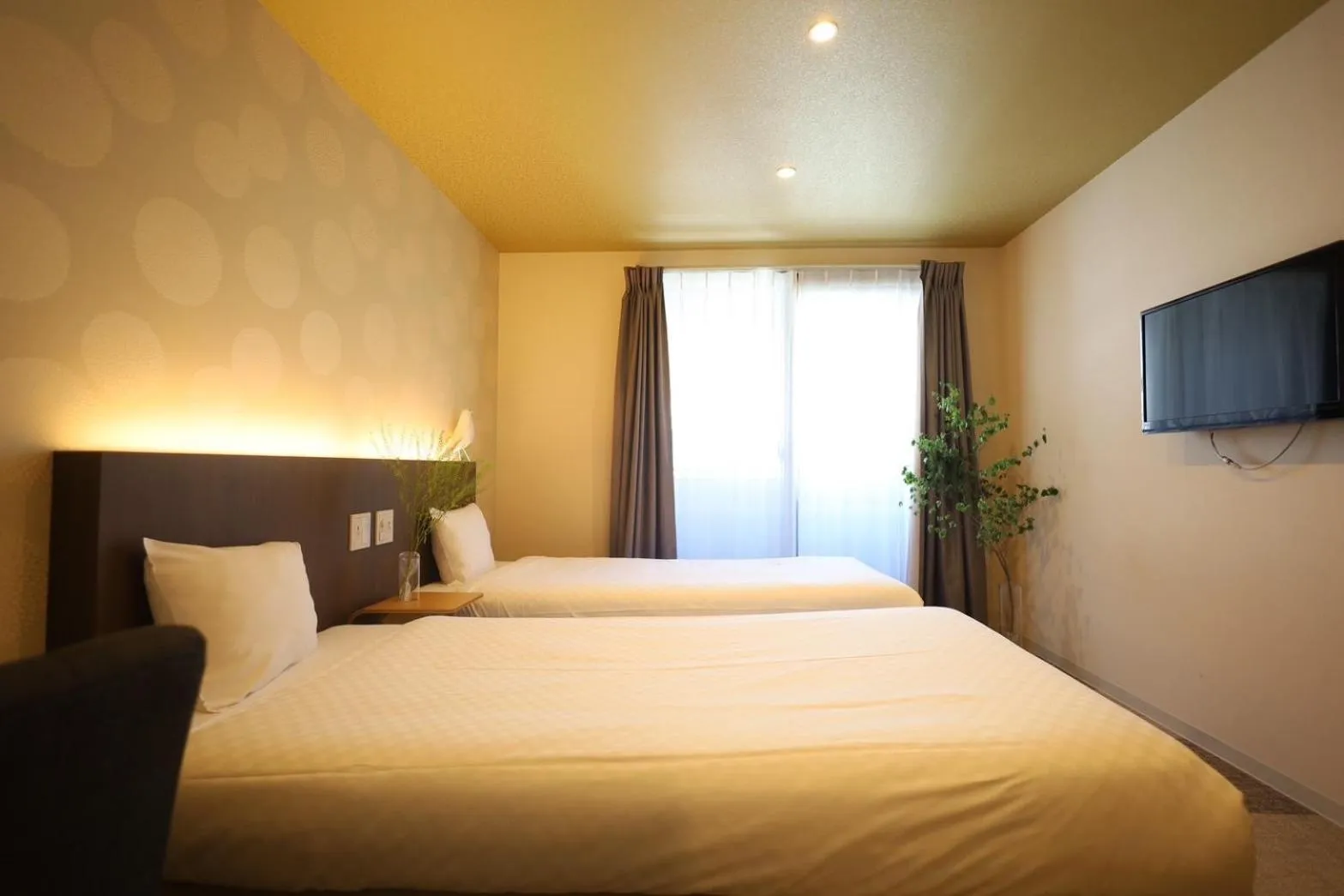 Bed in HOTEL THE POINT Kiyomizu Gojo