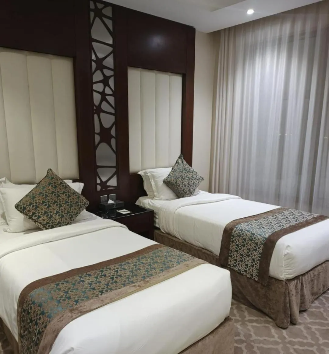 Bed in Sarwat Park Hotel