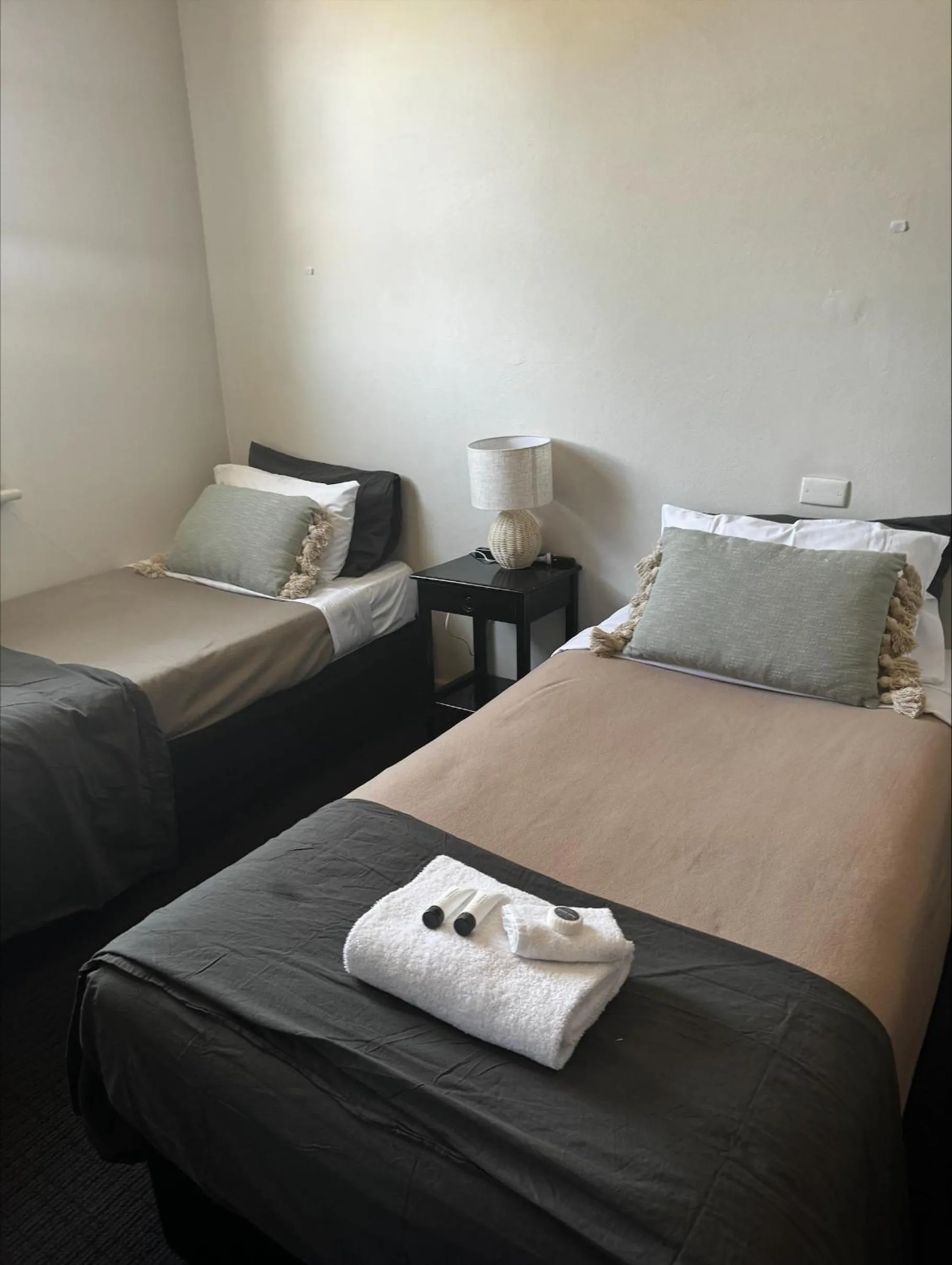 Bed in William Farrer Hotel