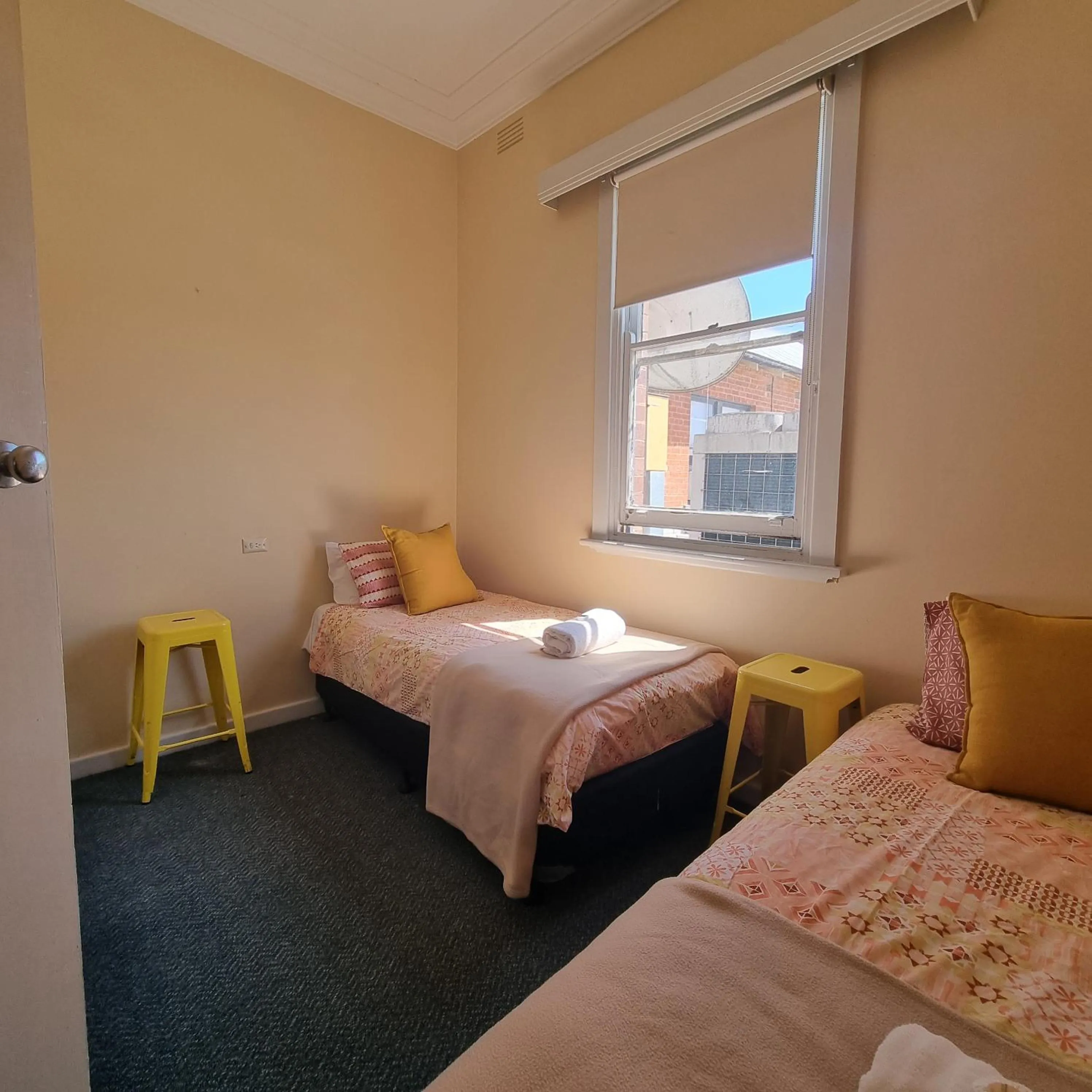 Bed in William Farrer Hotel