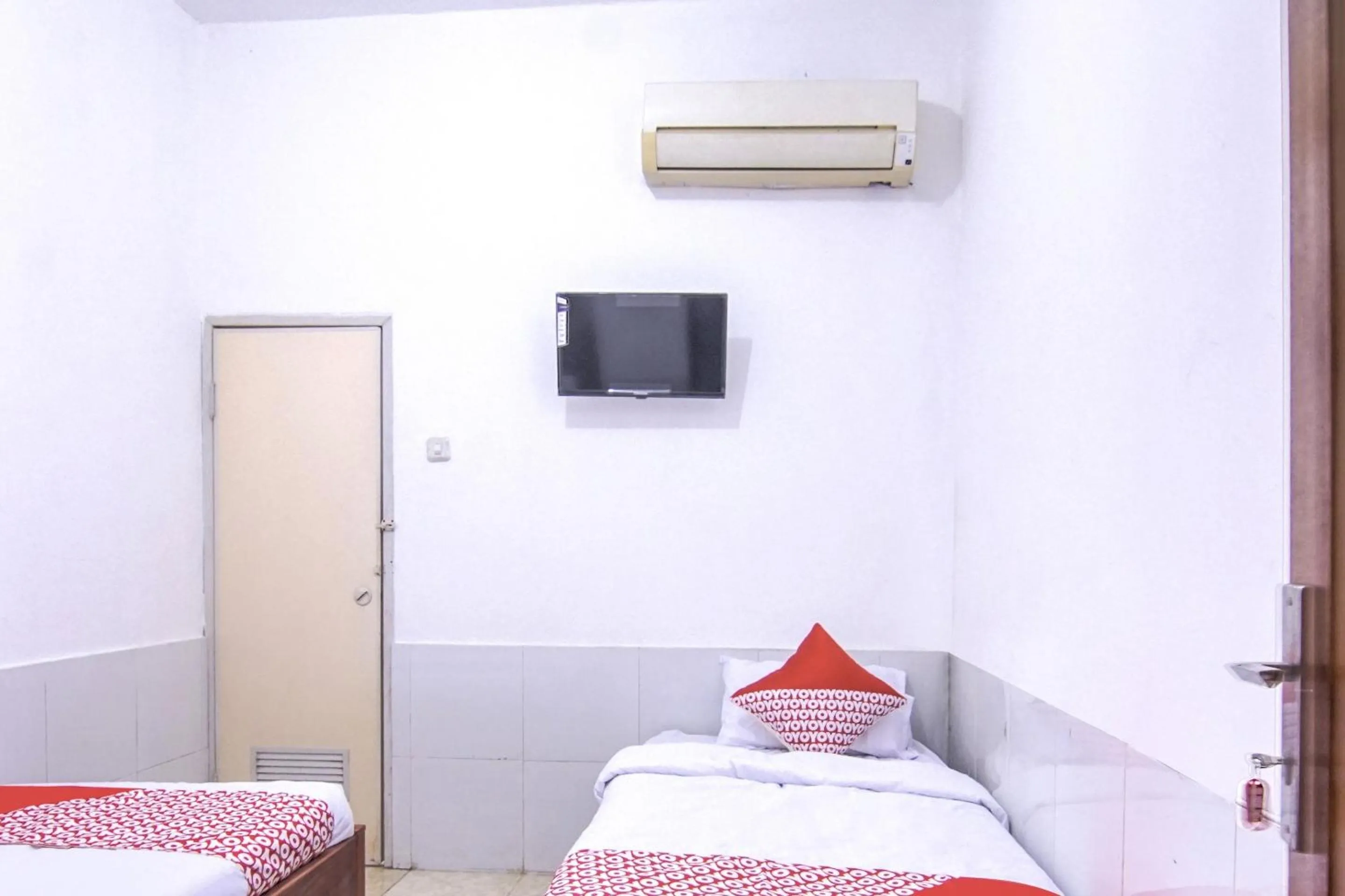 Bedroom in OYO 3317 Maju Jaya Homestay Syariah