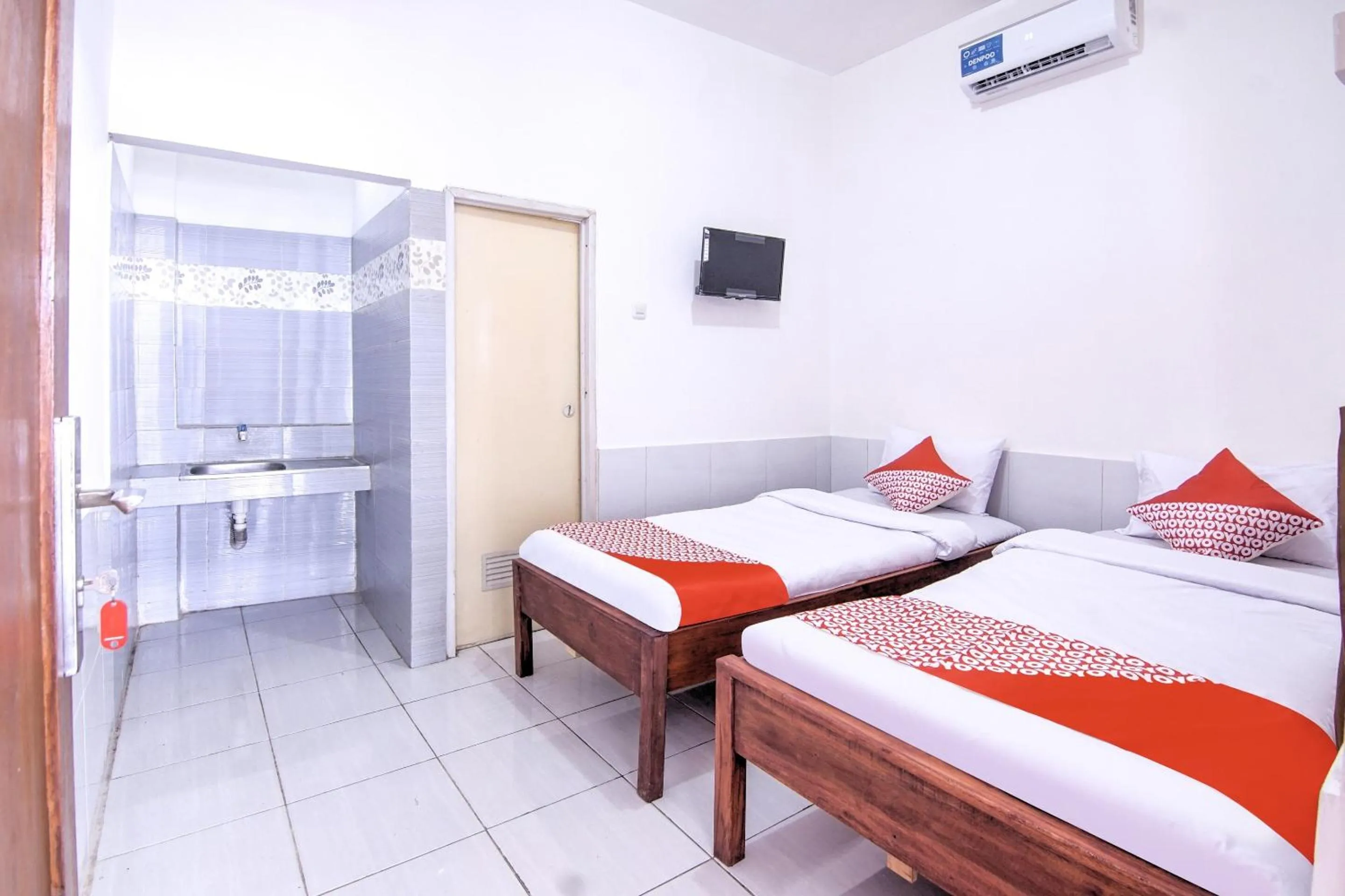 Bedroom in OYO 3317 Maju Jaya Homestay Syariah