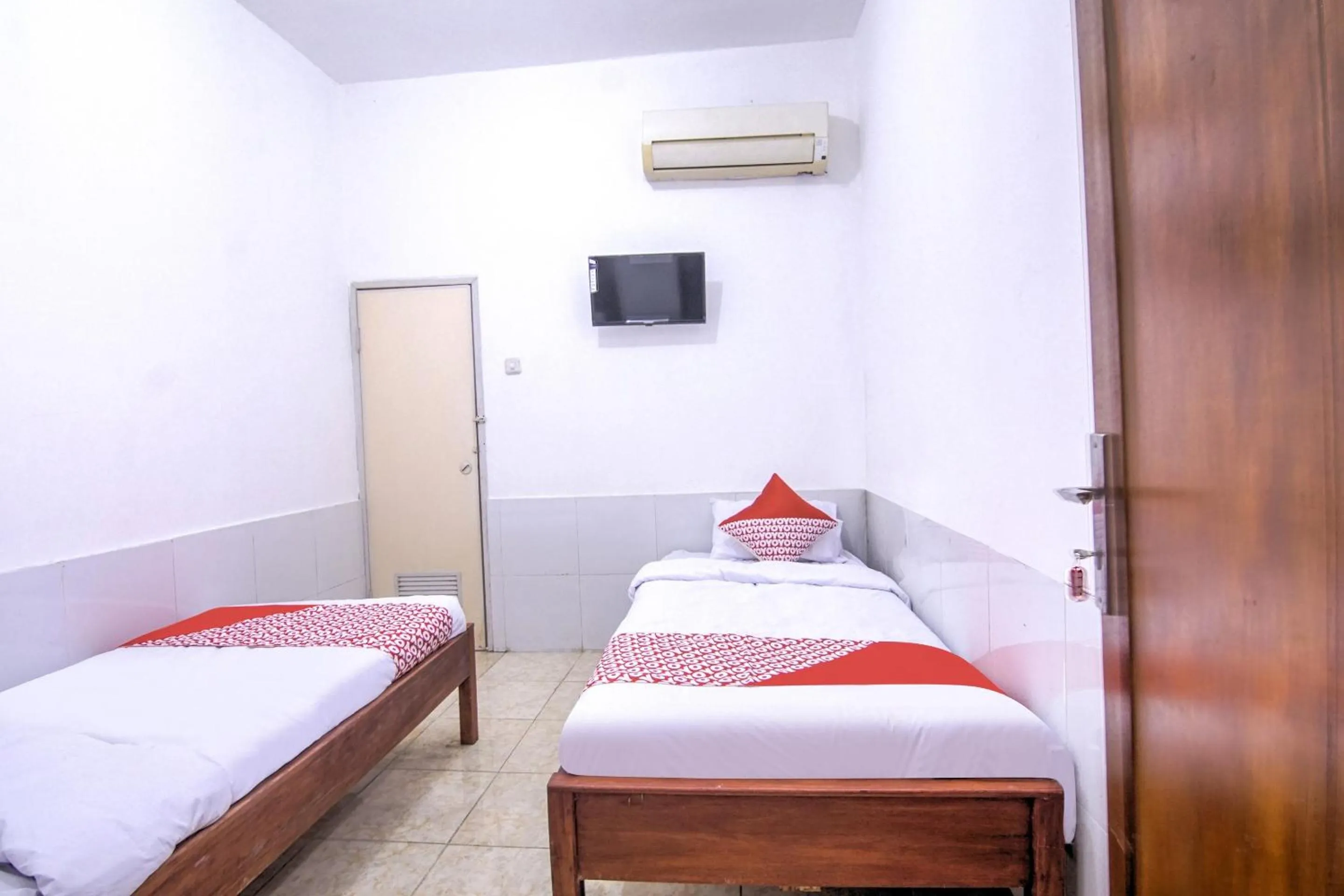 Bedroom in OYO 3317 Maju Jaya Homestay Syariah