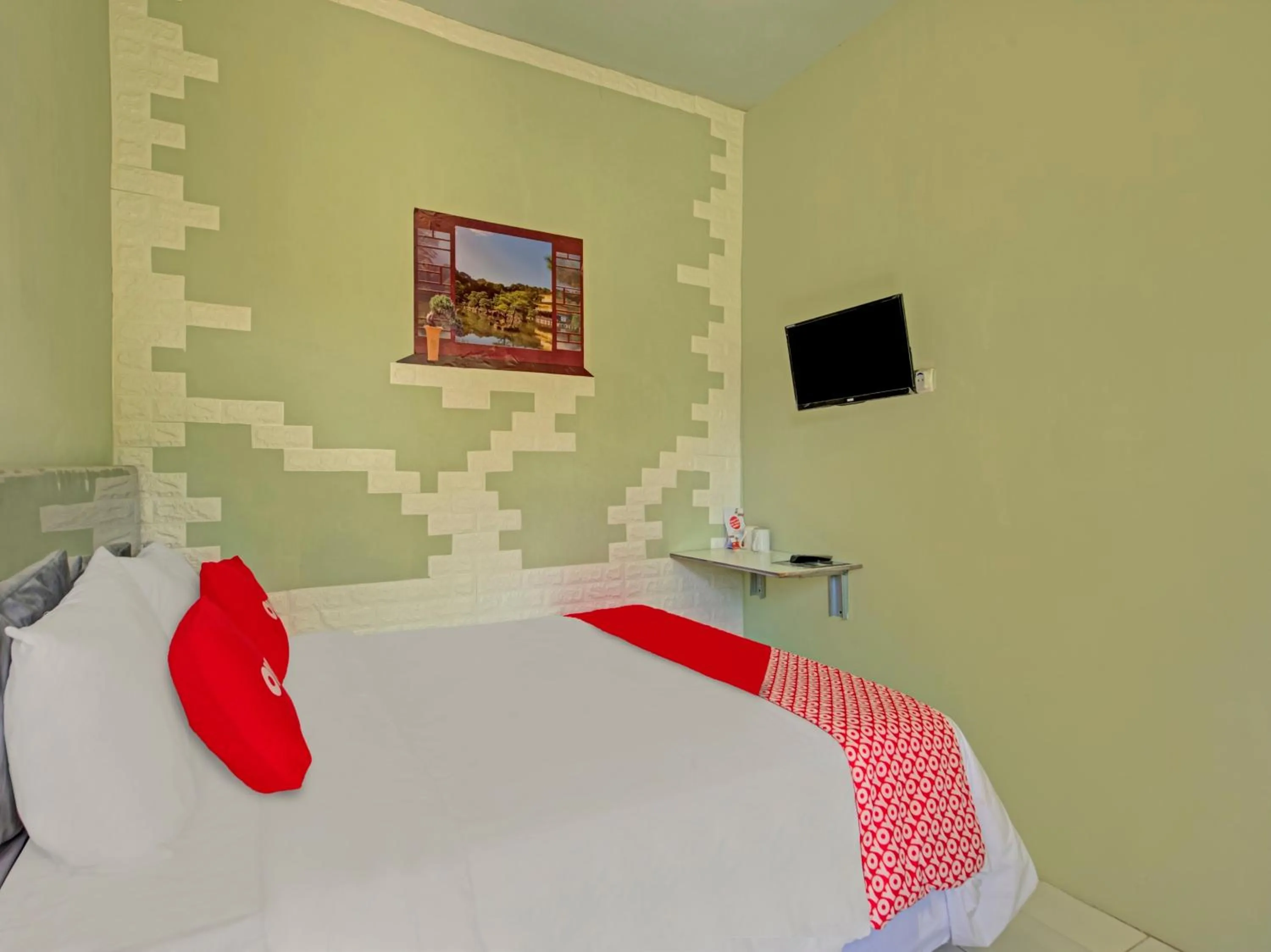 Bedroom, Bed in Hotel O Villa Inn App Trawas Bintaro Syariah