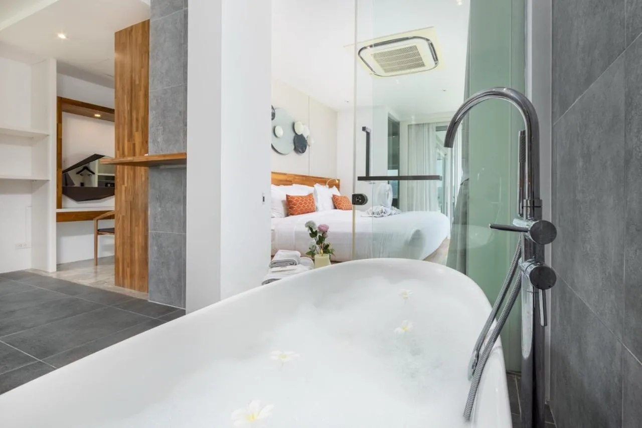 Bed in UniQue BoutiQue Resort