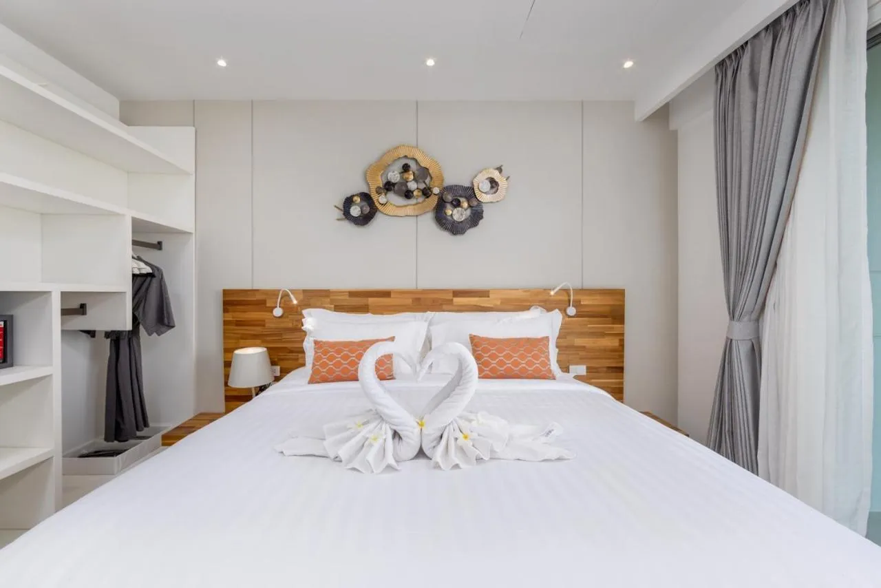 Bed in UniQue BoutiQue Resort