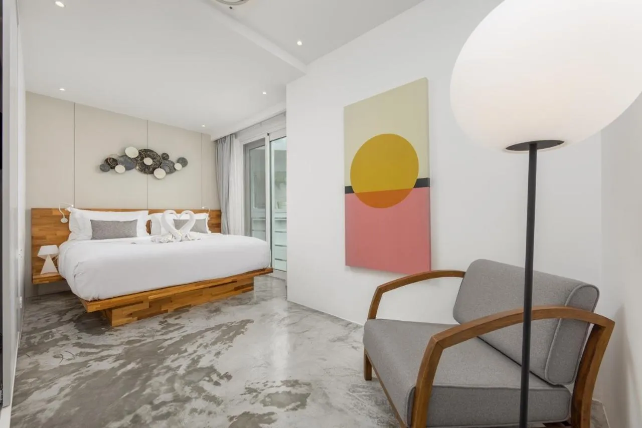 Bed in UniQue BoutiQue Resort