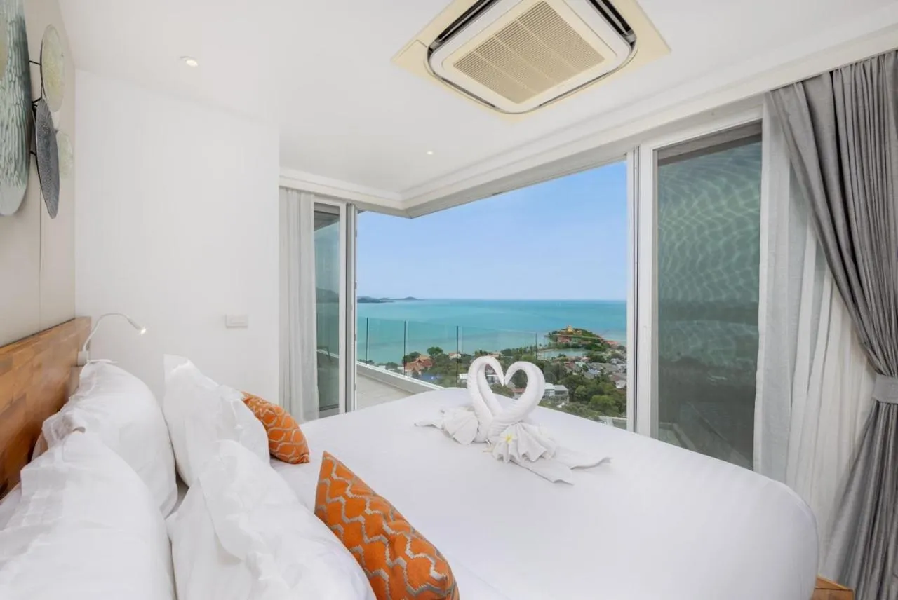 Bed in UniQue BoutiQue Resort