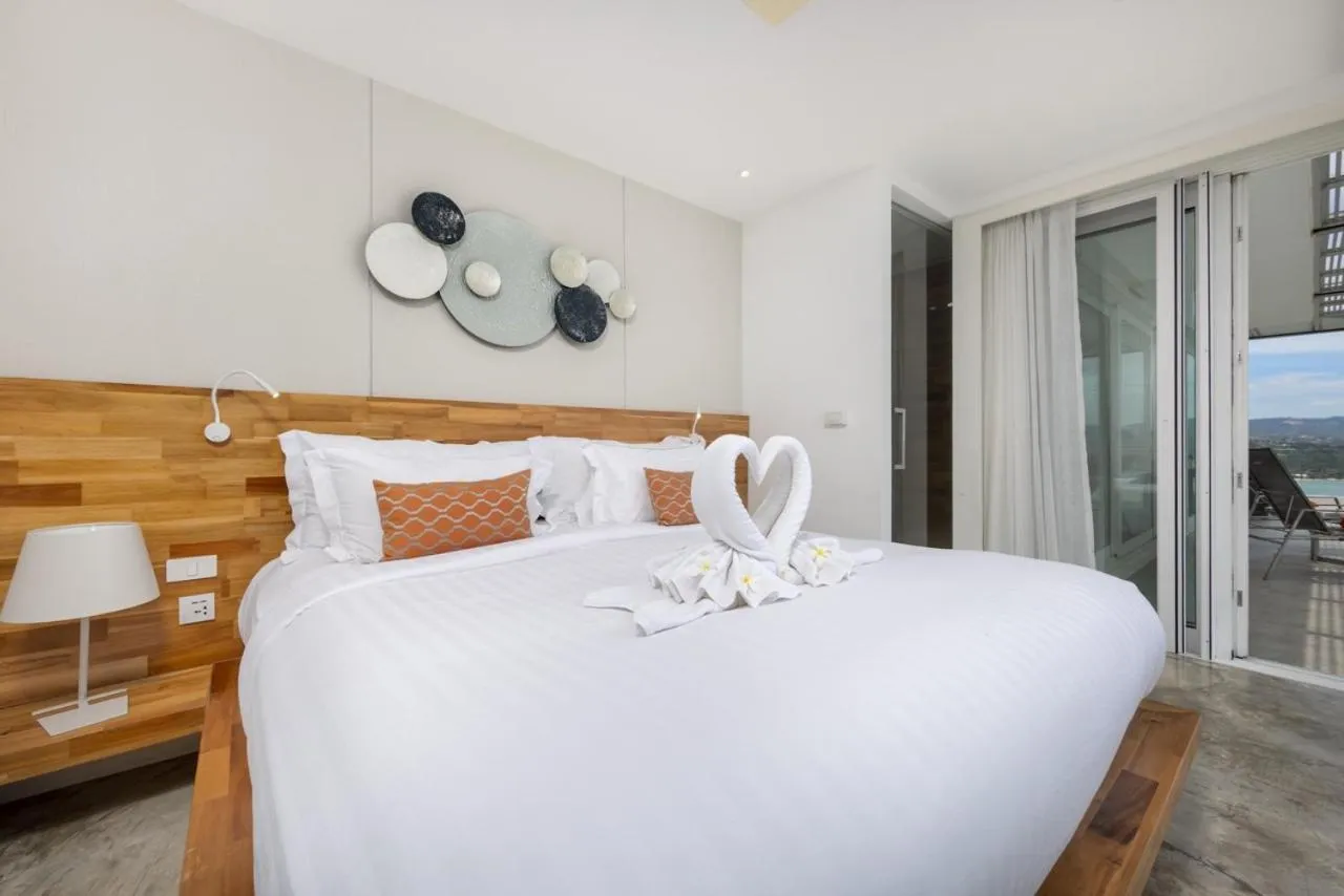 Bed in UniQue BoutiQue Resort