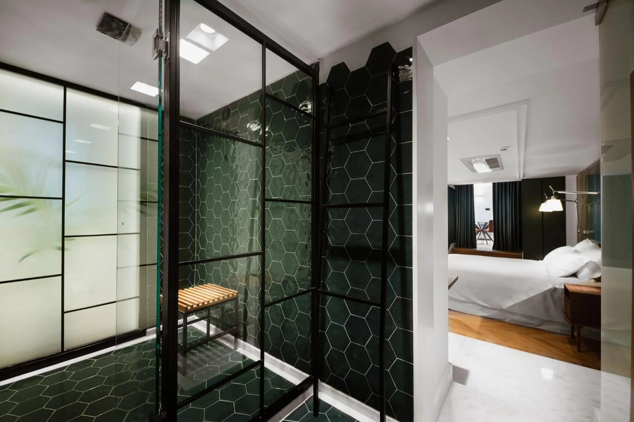 Bathroom, Bed in The Bold Type Hotel, a Member of Design Hotels