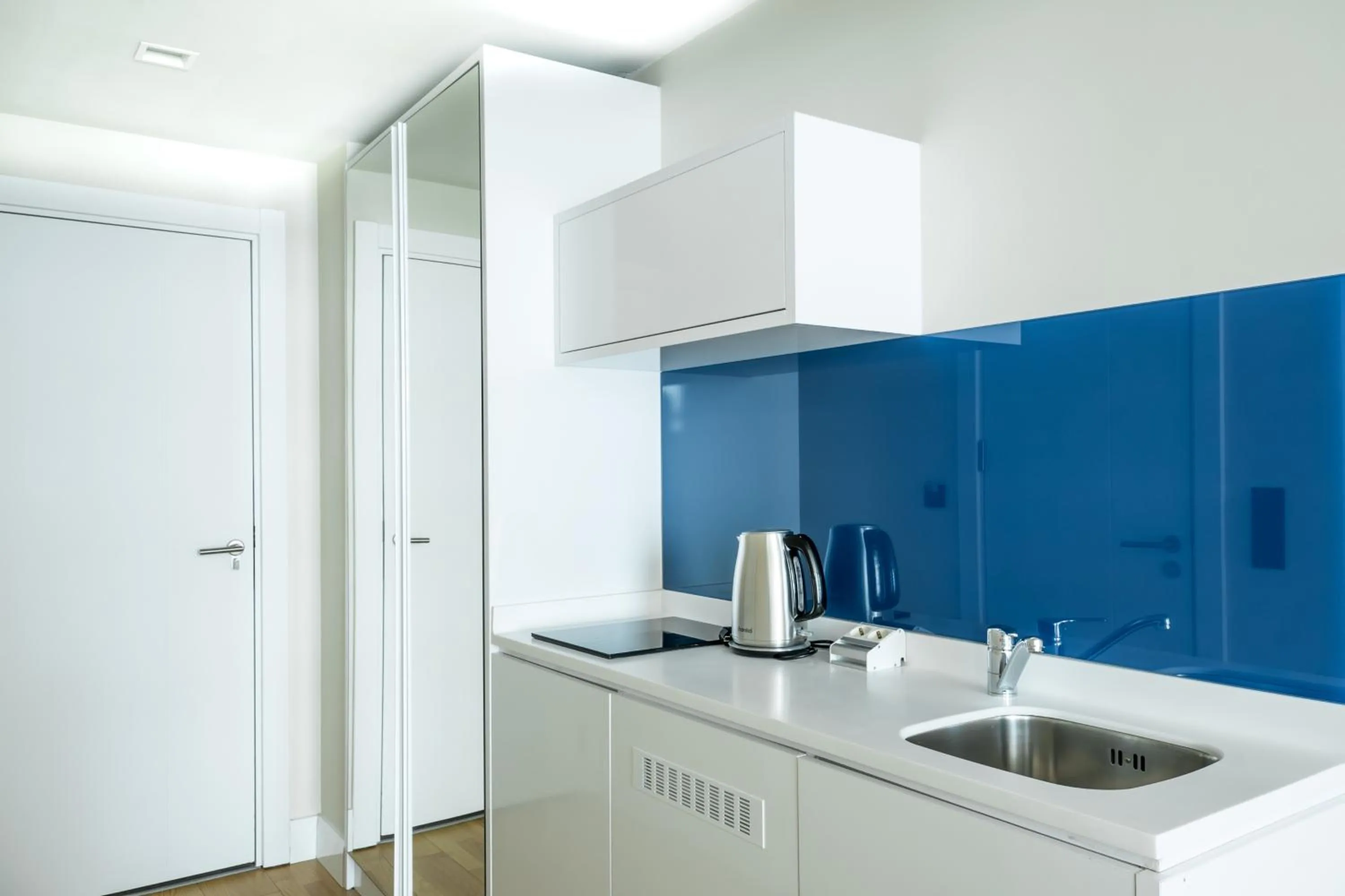 Kitchen or kitchenette in Orbi City Hotel Official