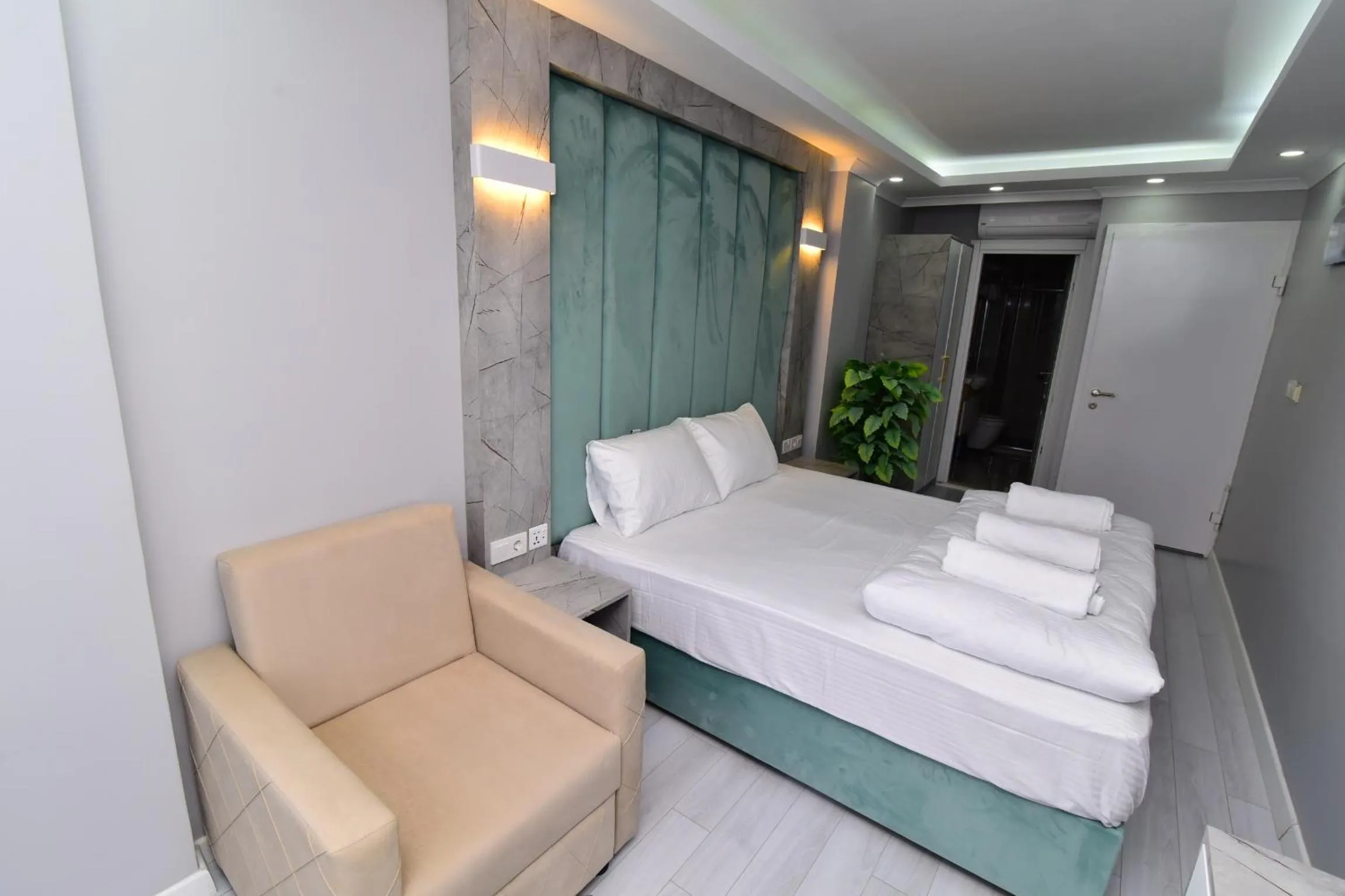 Seating area, Bed in Little sofia hotel