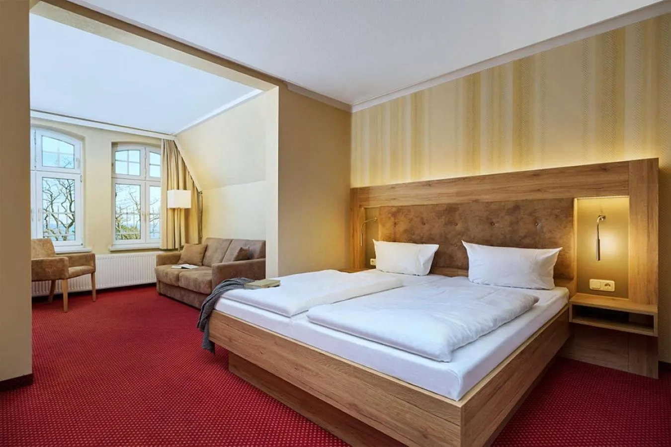 Photo of the whole room, Bed in Strandhotel garni Kormoran