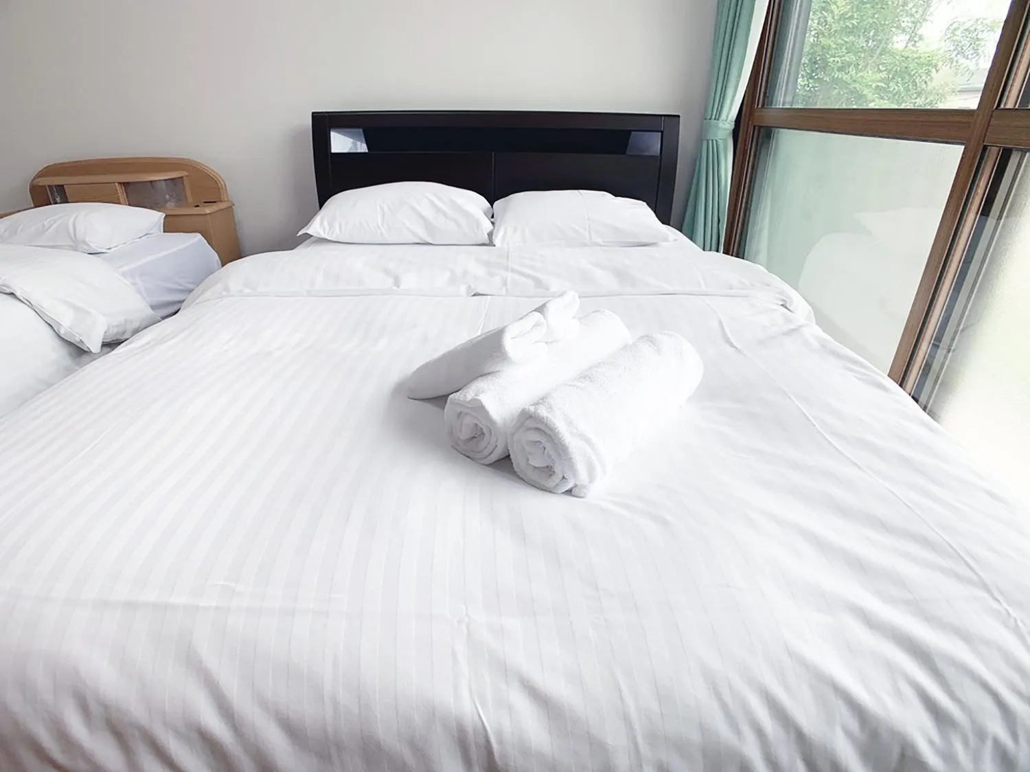 Bed in Itsukaichi First Villa Hiroshima