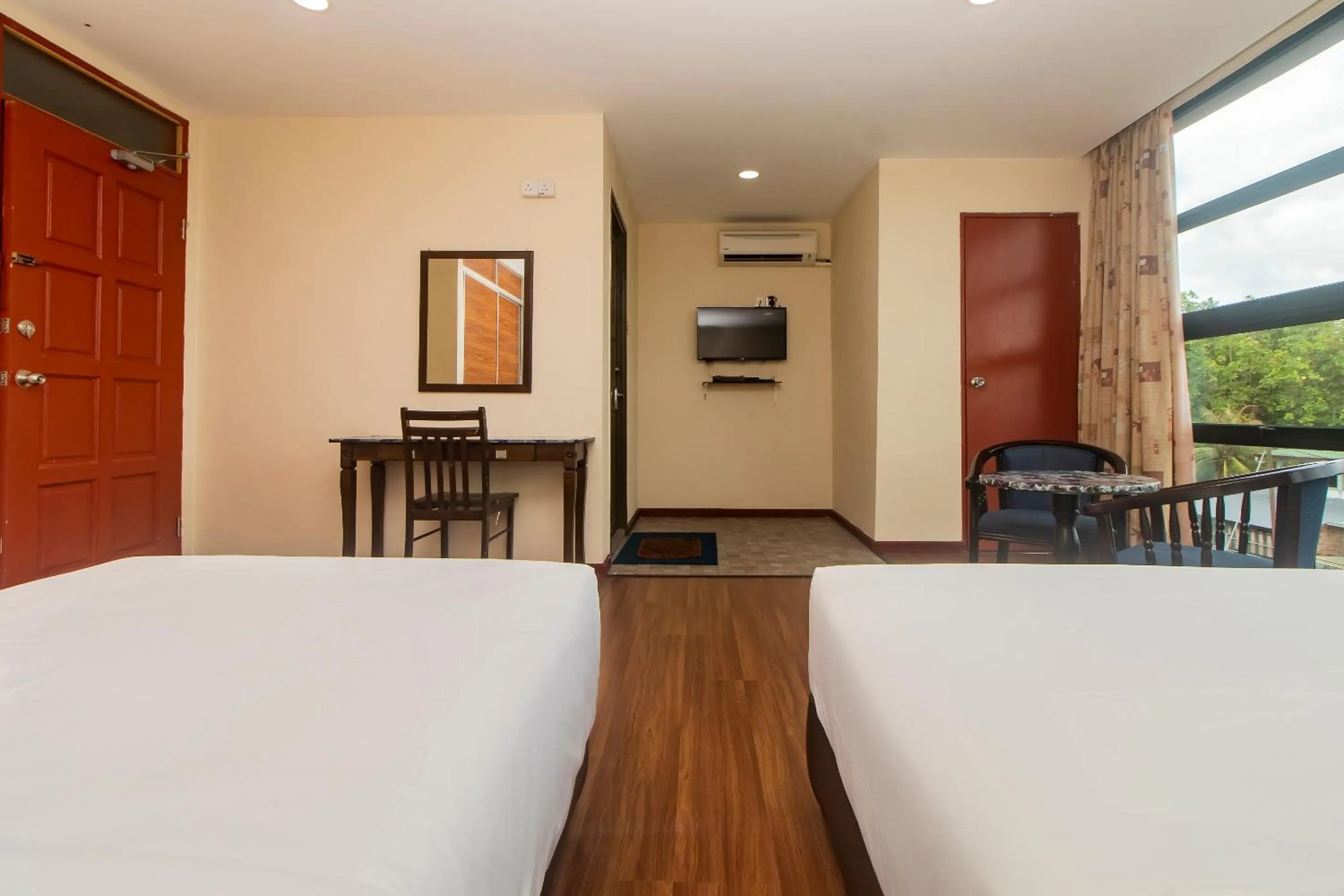 Bedroom in Hotel O Ltk Home