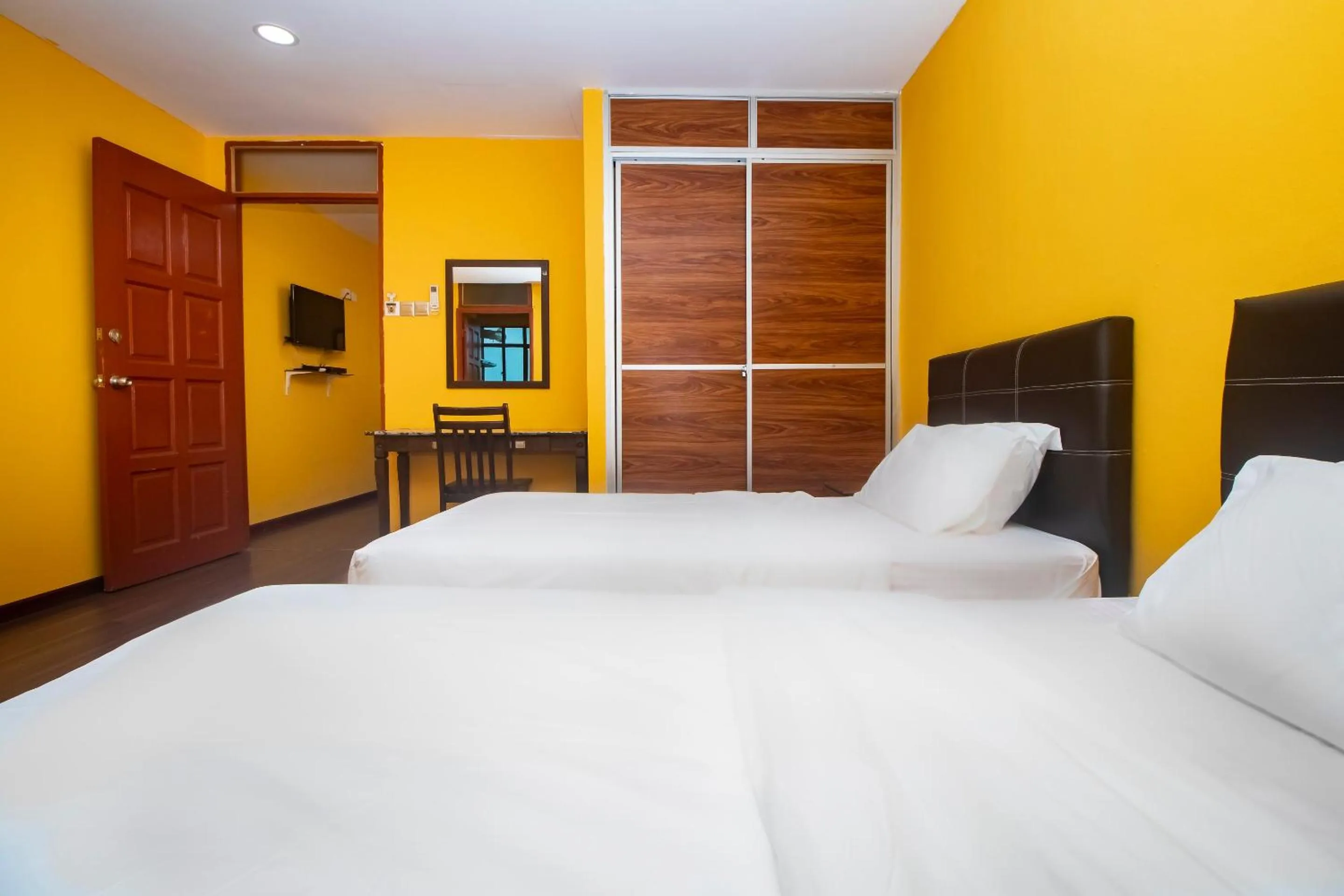 Bedroom in Hotel O Ltk Home