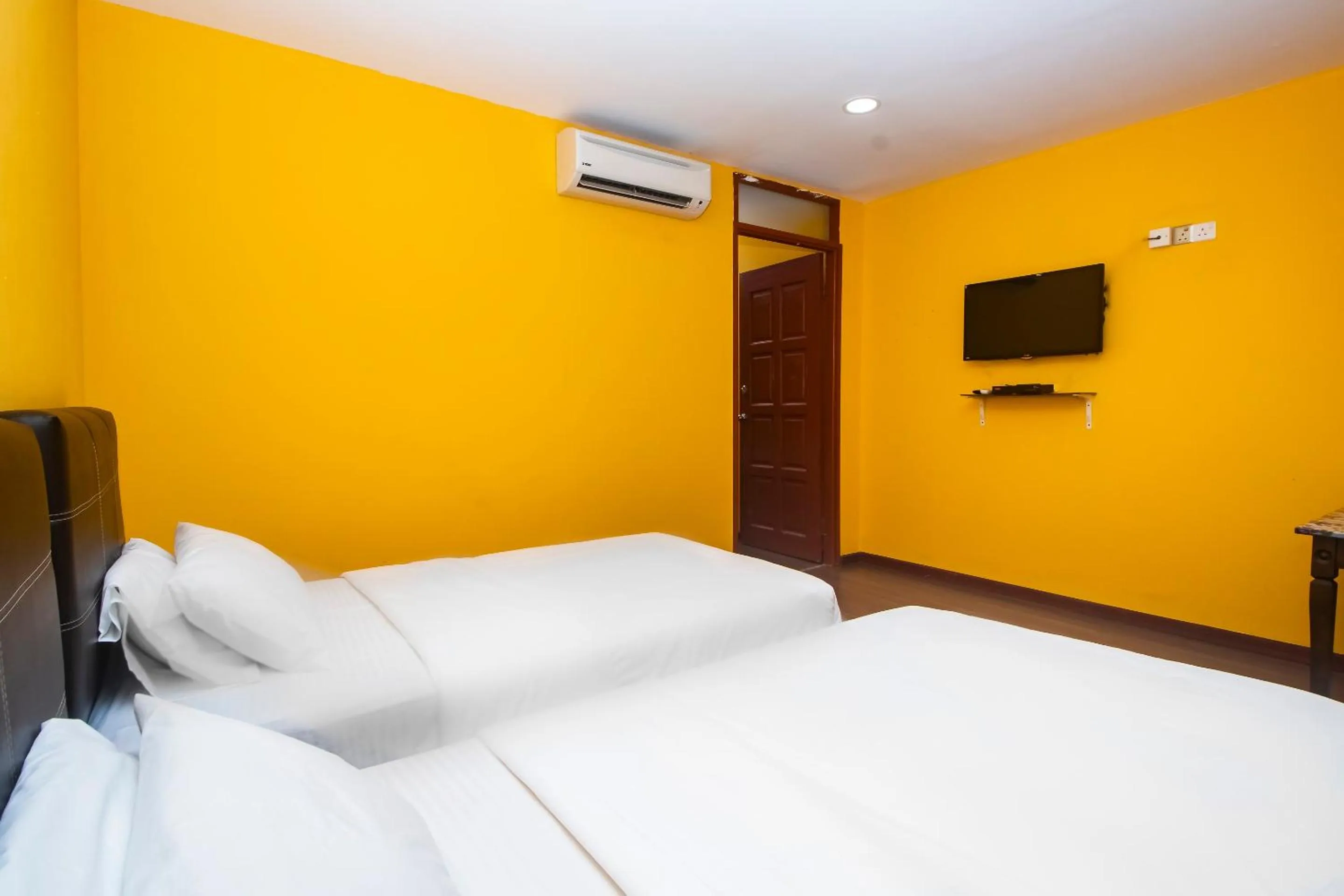 Bedroom in Hotel O Ltk Home