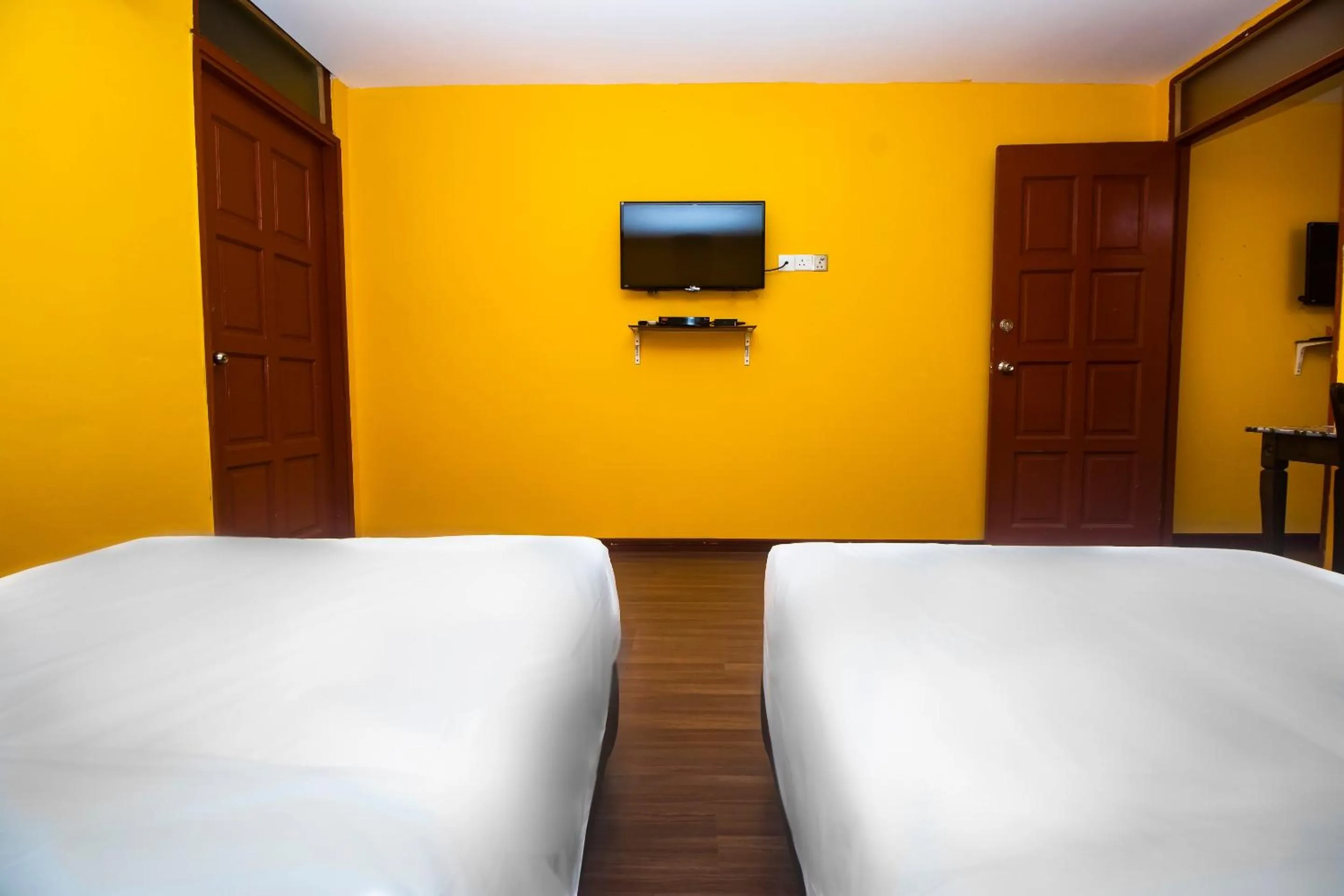 Bedroom in Hotel O Ltk Home