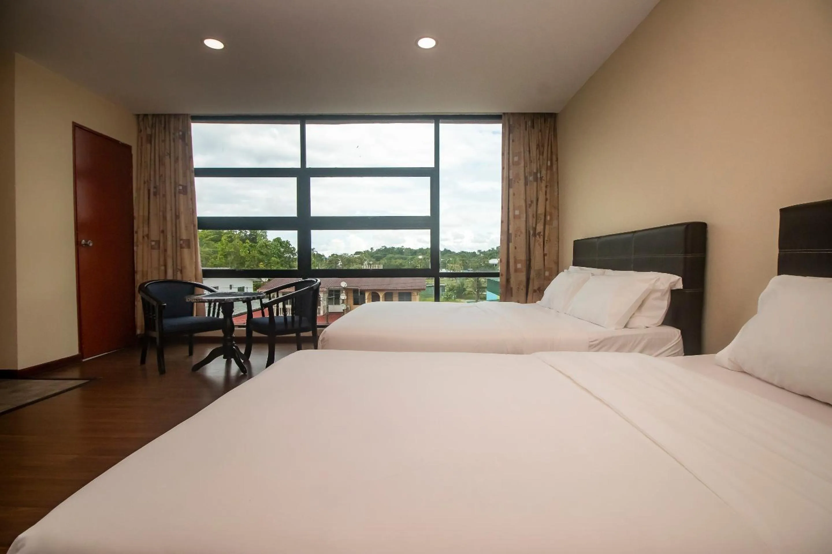 Bedroom in Hotel O Ltk Home