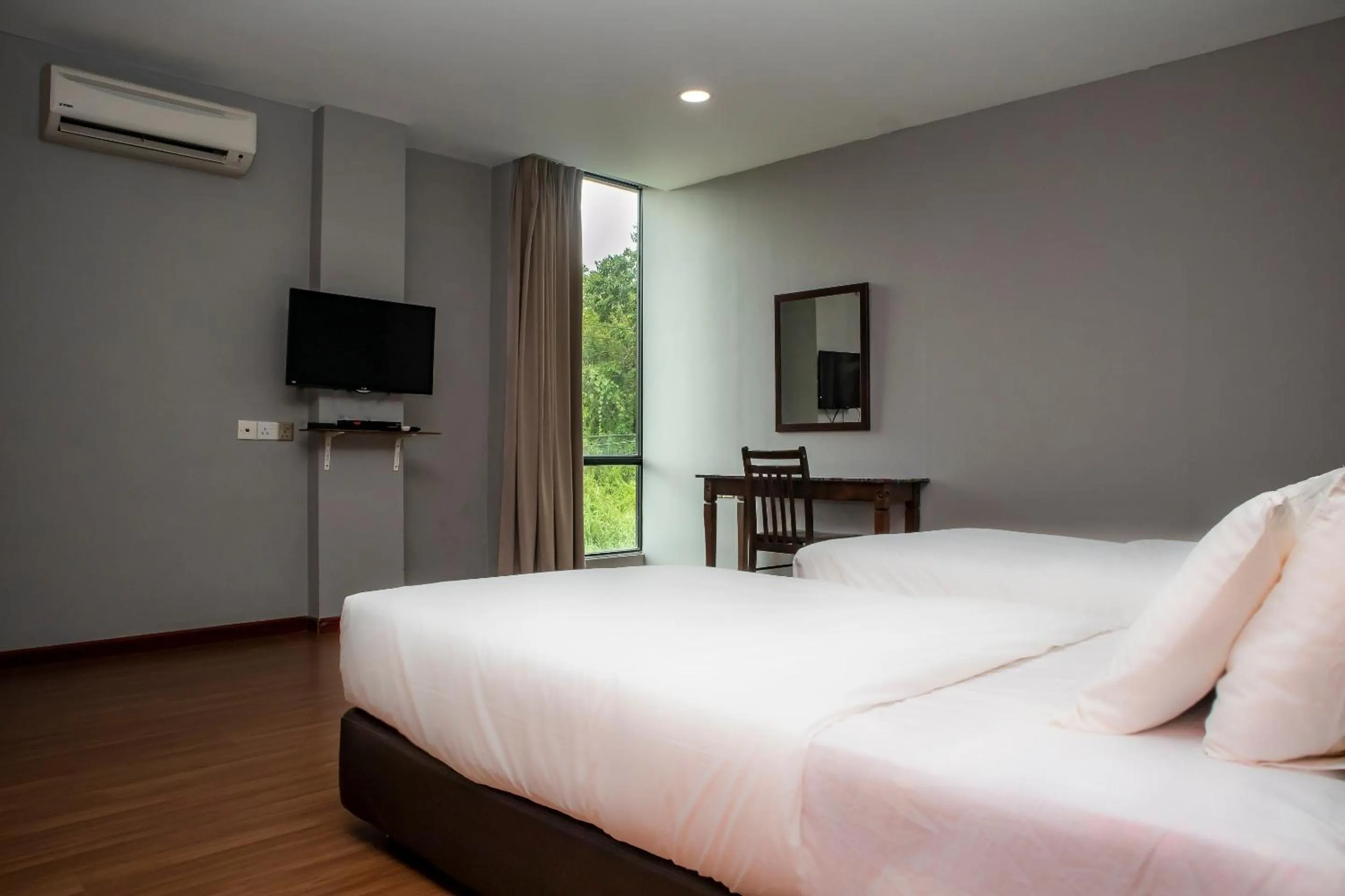 Bedroom in Hotel O Ltk Home
