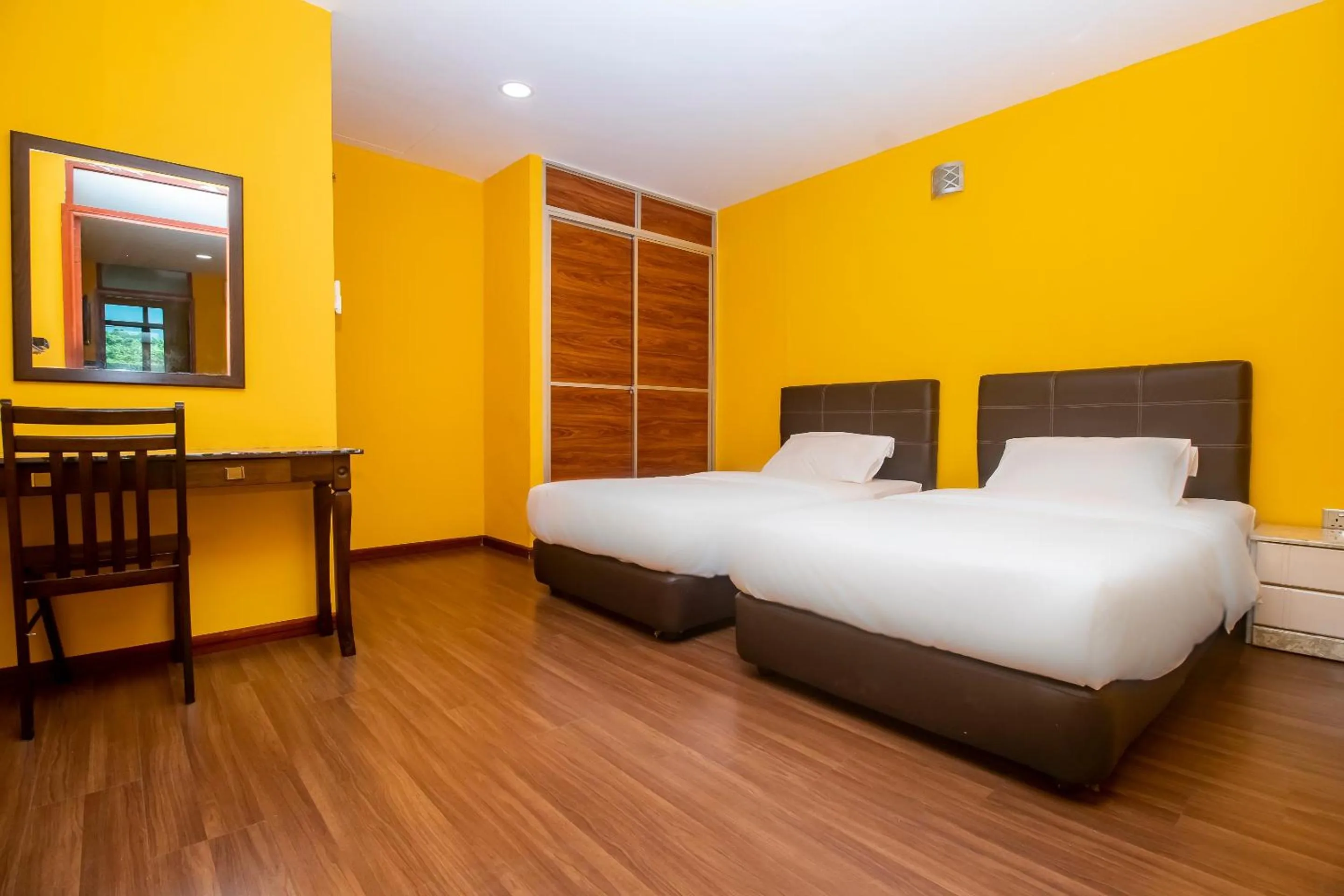 Bedroom in Hotel O Ltk Home