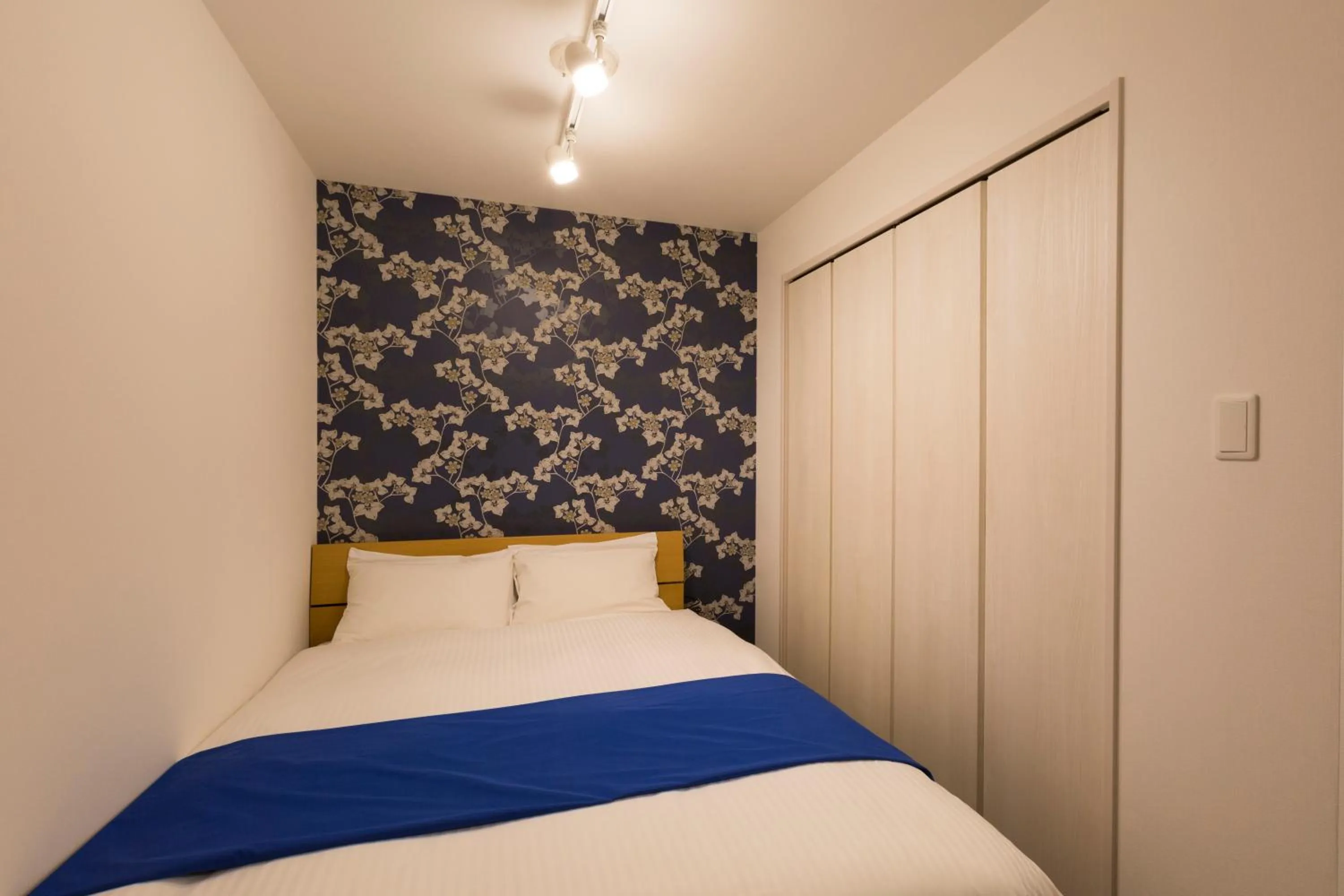 Bed in Hotel ONE'S RESIDENCE