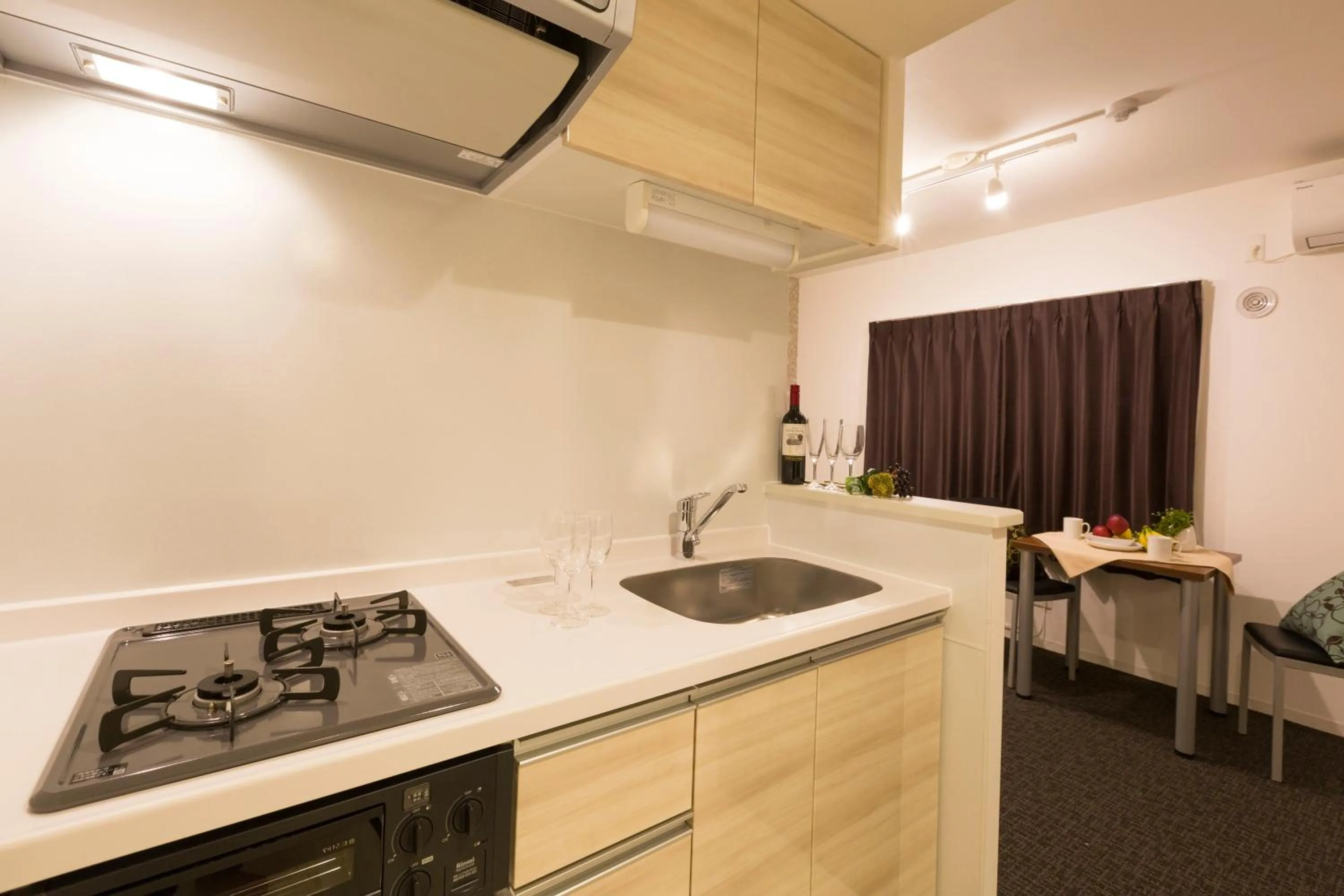 Kitchen or kitchenette in Hotel ONE'S RESIDENCE