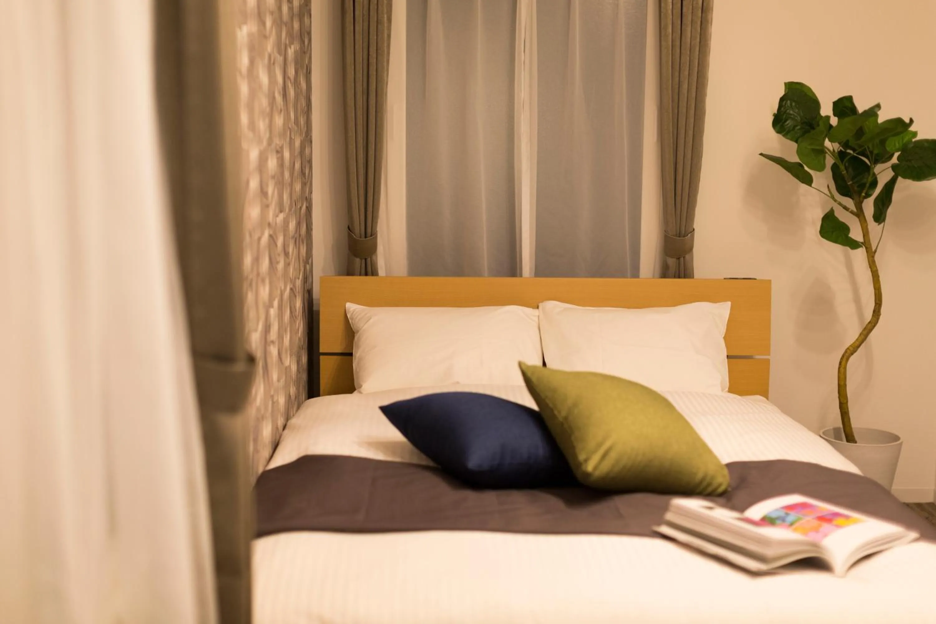 Bed in Hotel ONE'S RESIDENCE