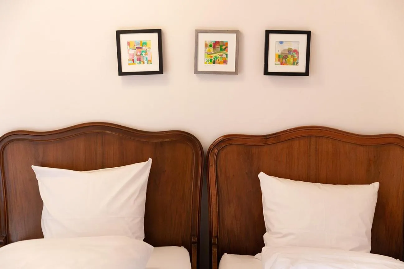 Bed in Gasthof zum Schlüssel La Méridienne Fribourg SA