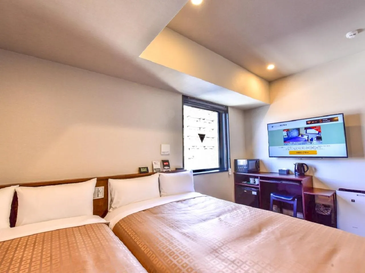 Bed in HOTEL LiVEMAX Hakata Nakasu