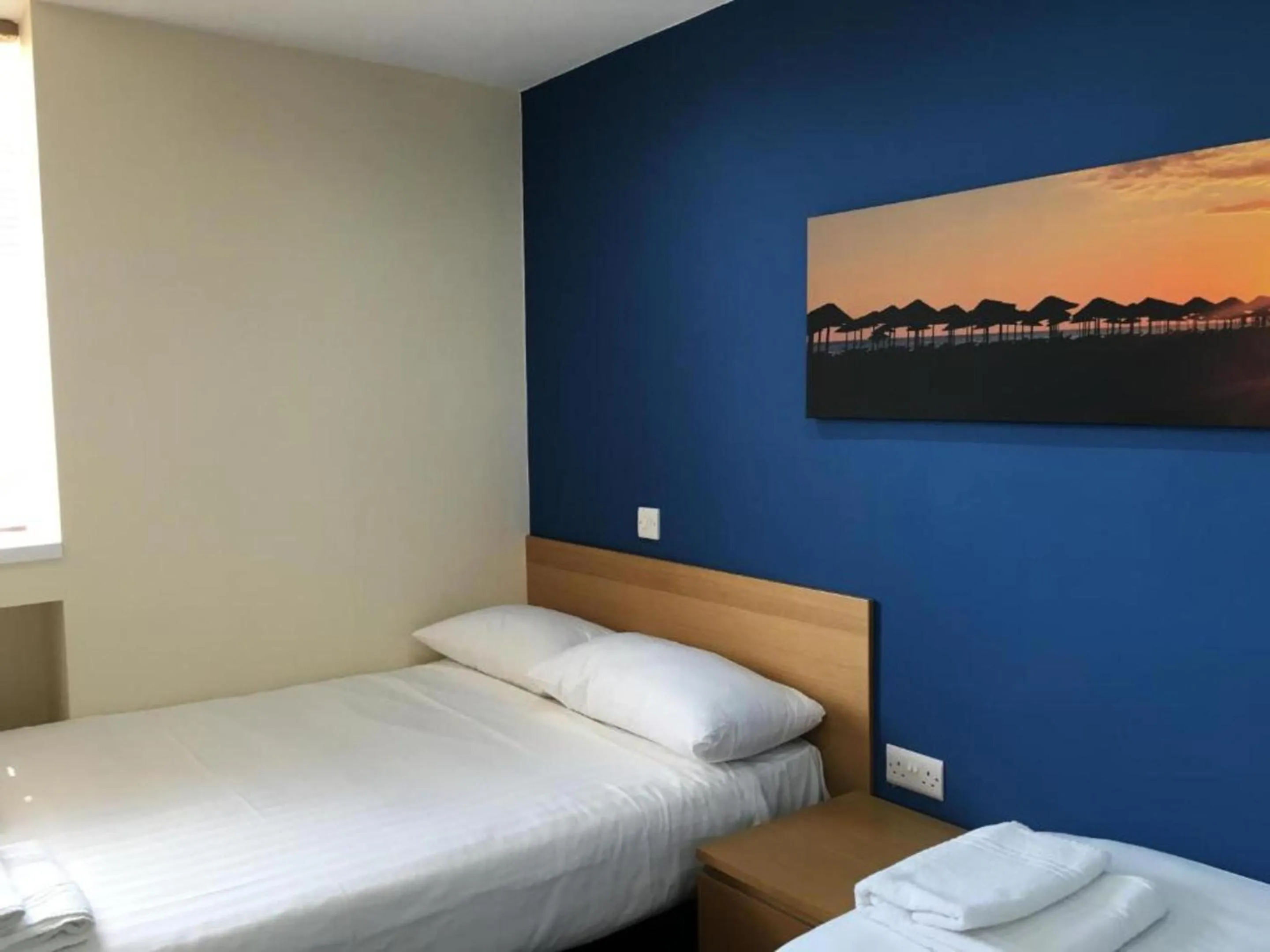 Bedroom, Bed in OYO Wave Crest Hotel