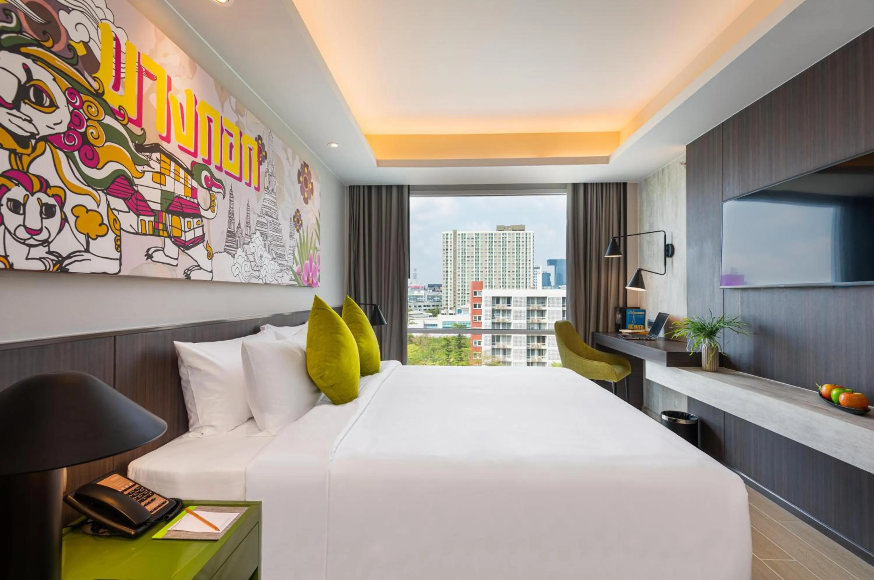 Bed in Maitria Hotel Rama 9 Bangkok - A Chatrium Collection