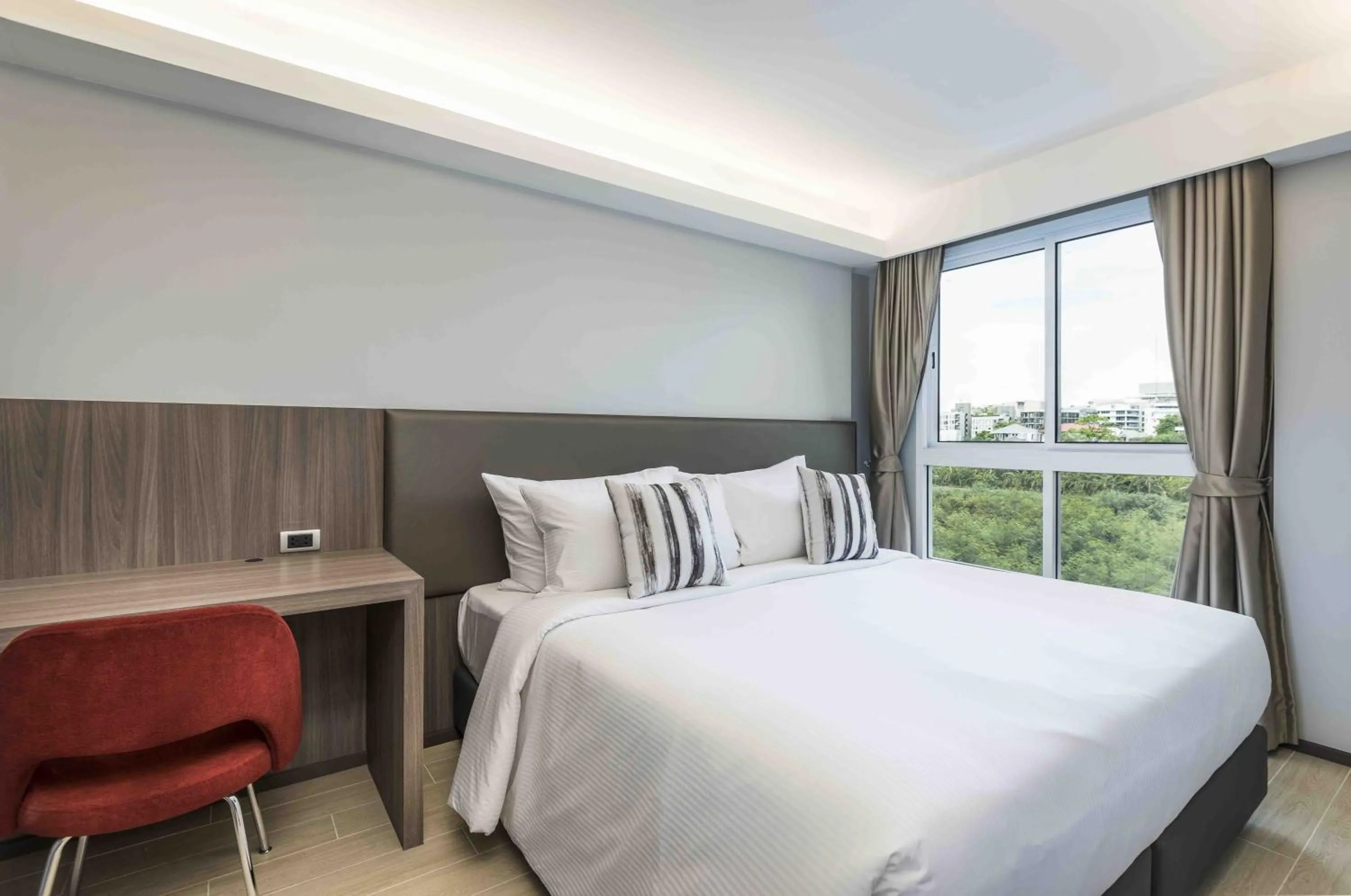 Bedroom, Bed in Maitria Hotel Rama 9 Bangkok - A Chatrium Collection