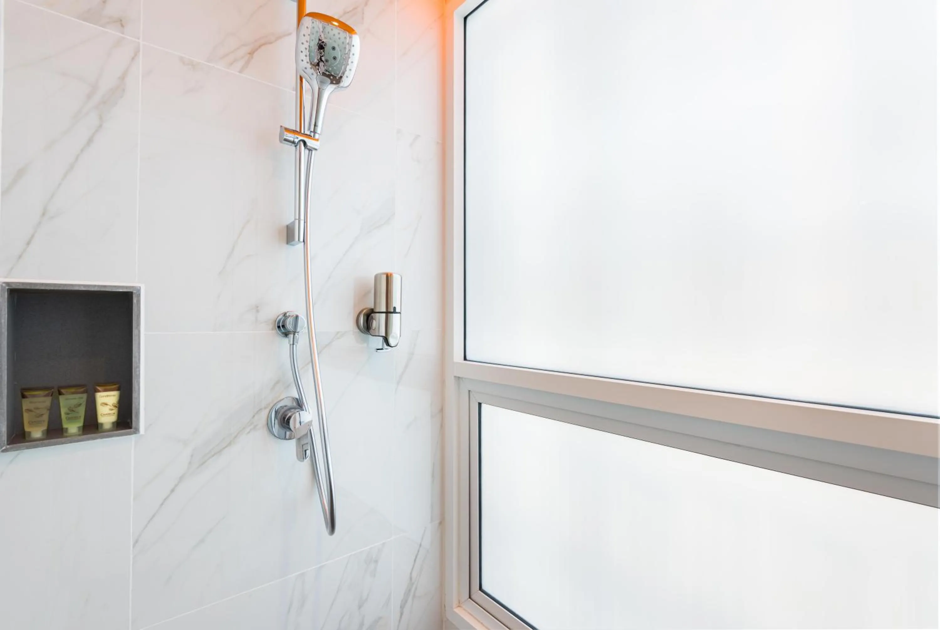 Shower in Maitria Hotel Rama 9 Bangkok - A Chatrium Collection