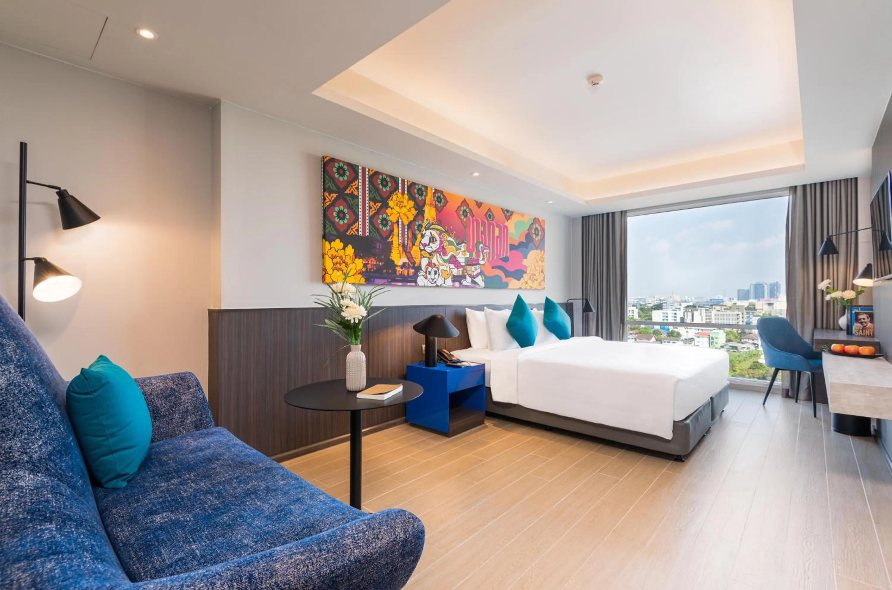 Seating area, Bed in Maitria Hotel Rama 9 Bangkok - A Chatrium Collection