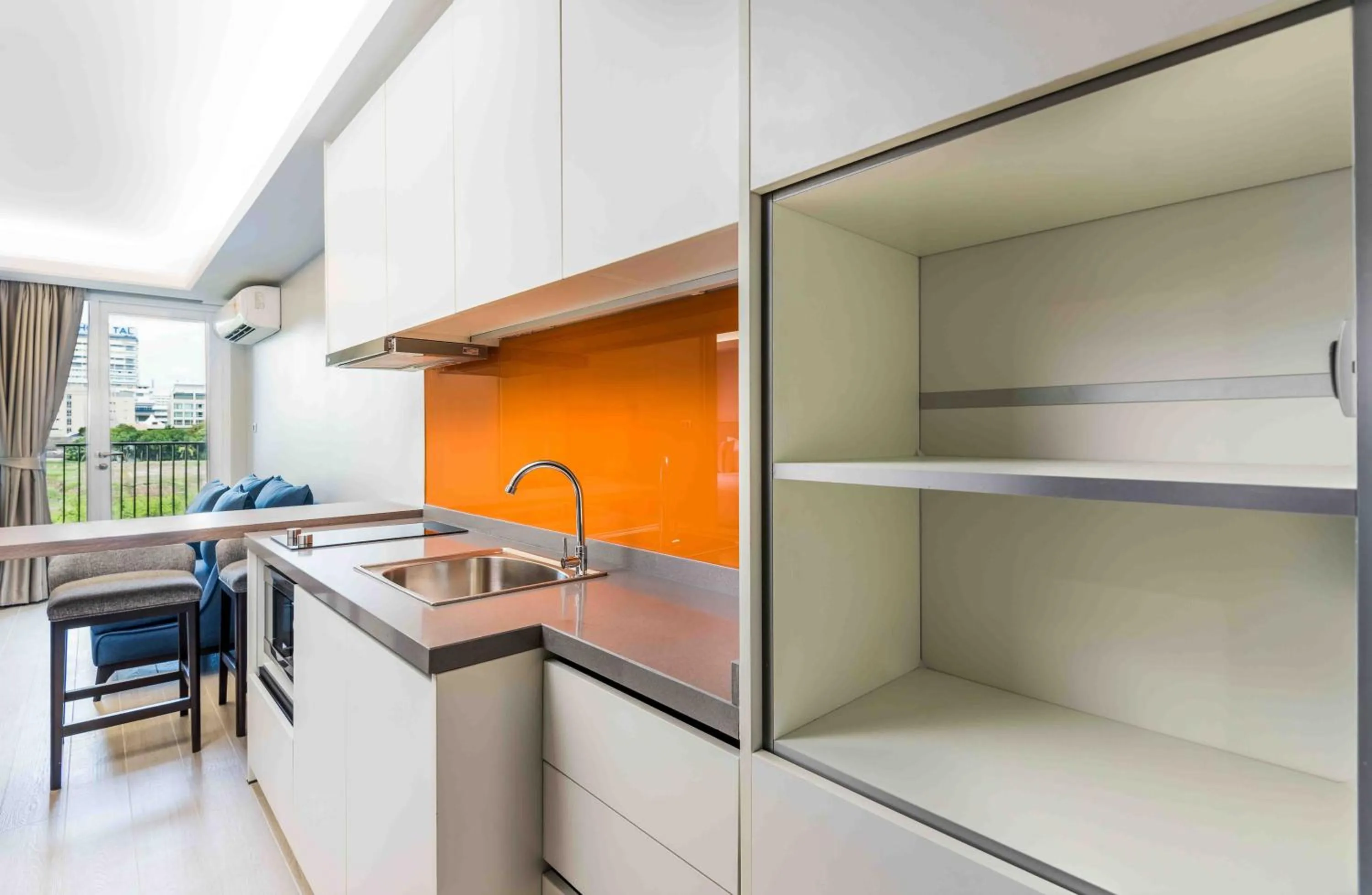 Kitchen or kitchenette in Maitria Hotel Rama 9 Bangkok - A Chatrium Collection