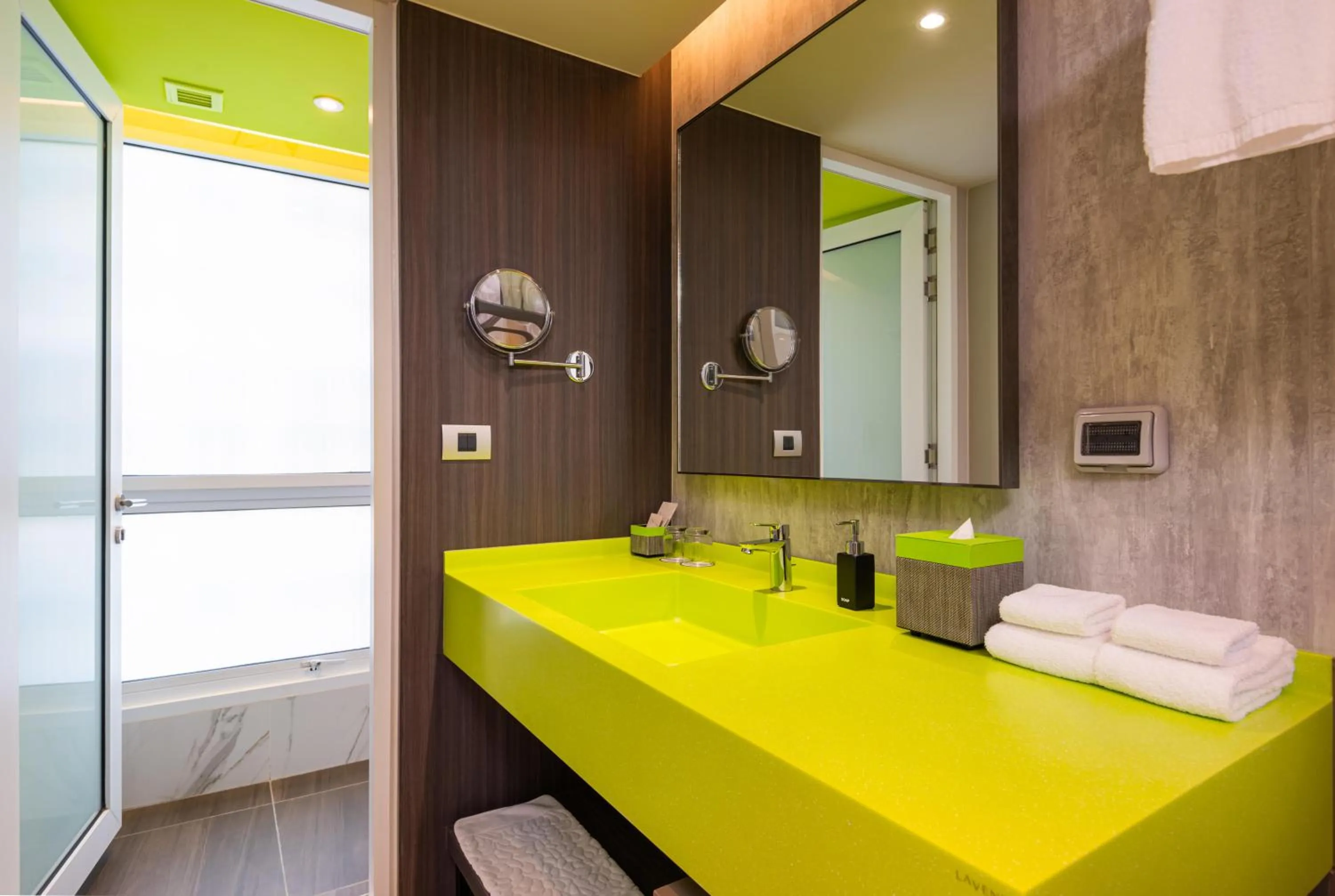 Bathroom in Maitria Hotel Rama 9 Bangkok - A Chatrium Collection