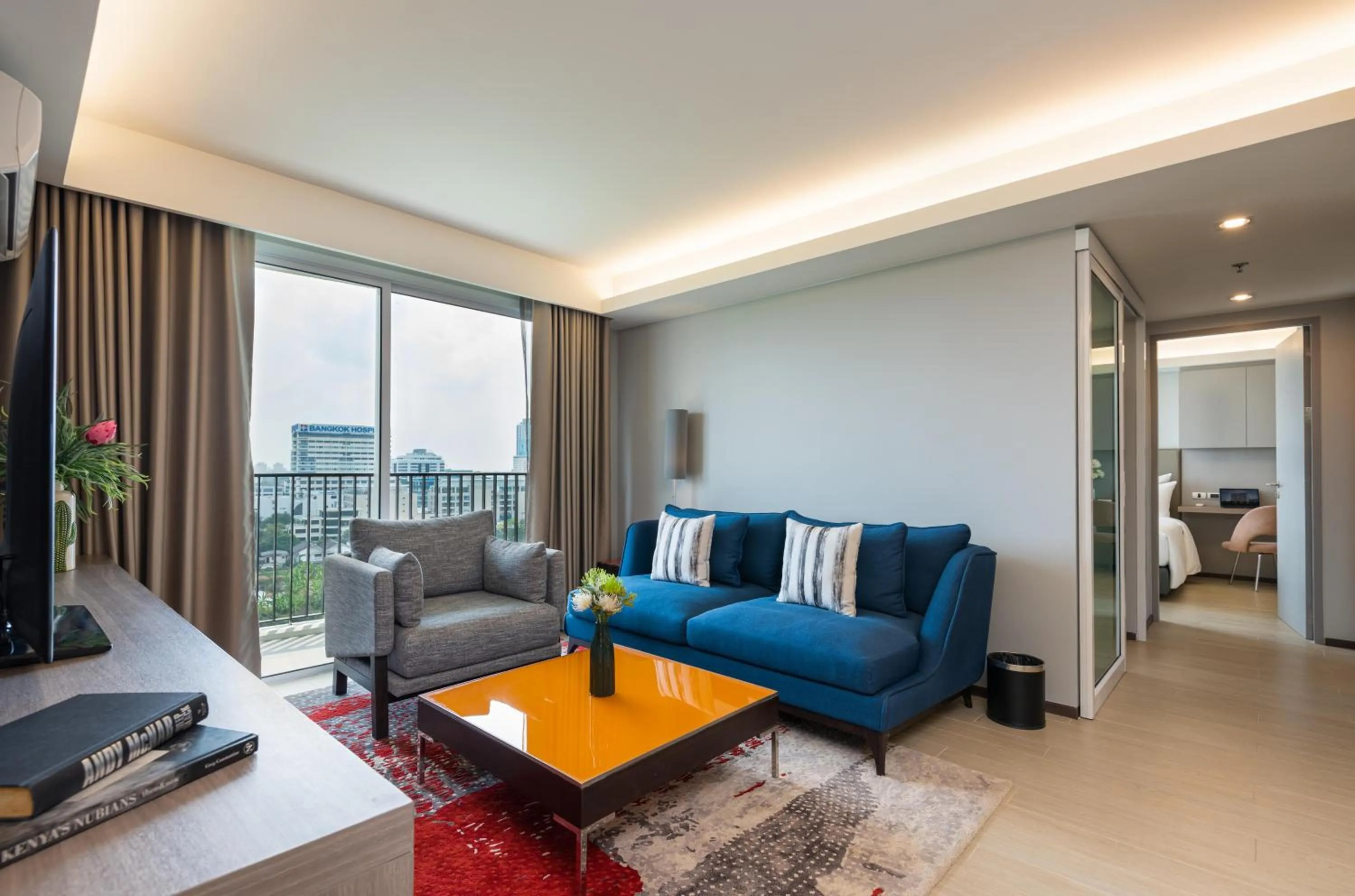 Living room in Maitria Hotel Rama 9 Bangkok - A Chatrium Collection