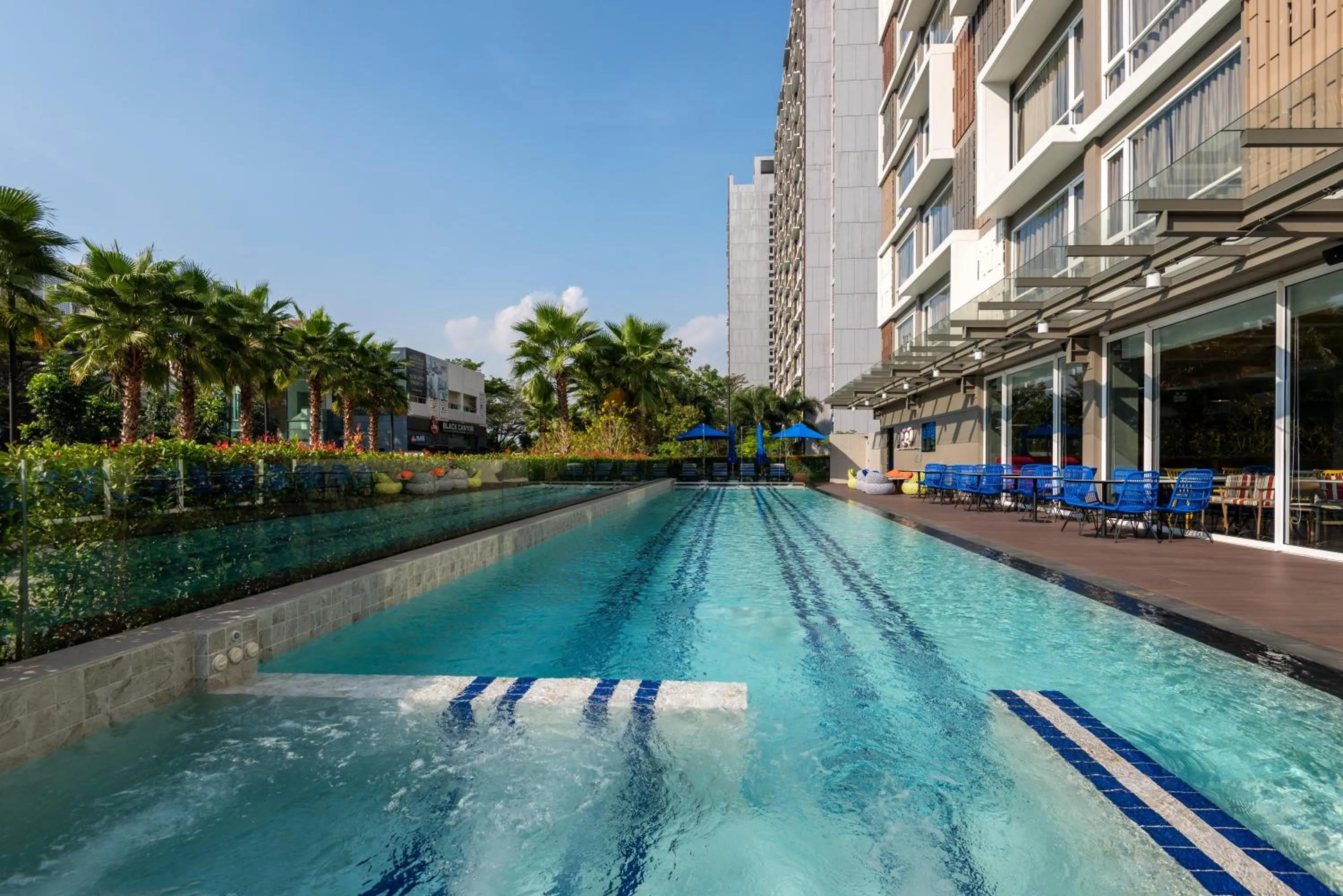 Swimming pool in Maitria Hotel Rama 9 Bangkok - A Chatrium Collection