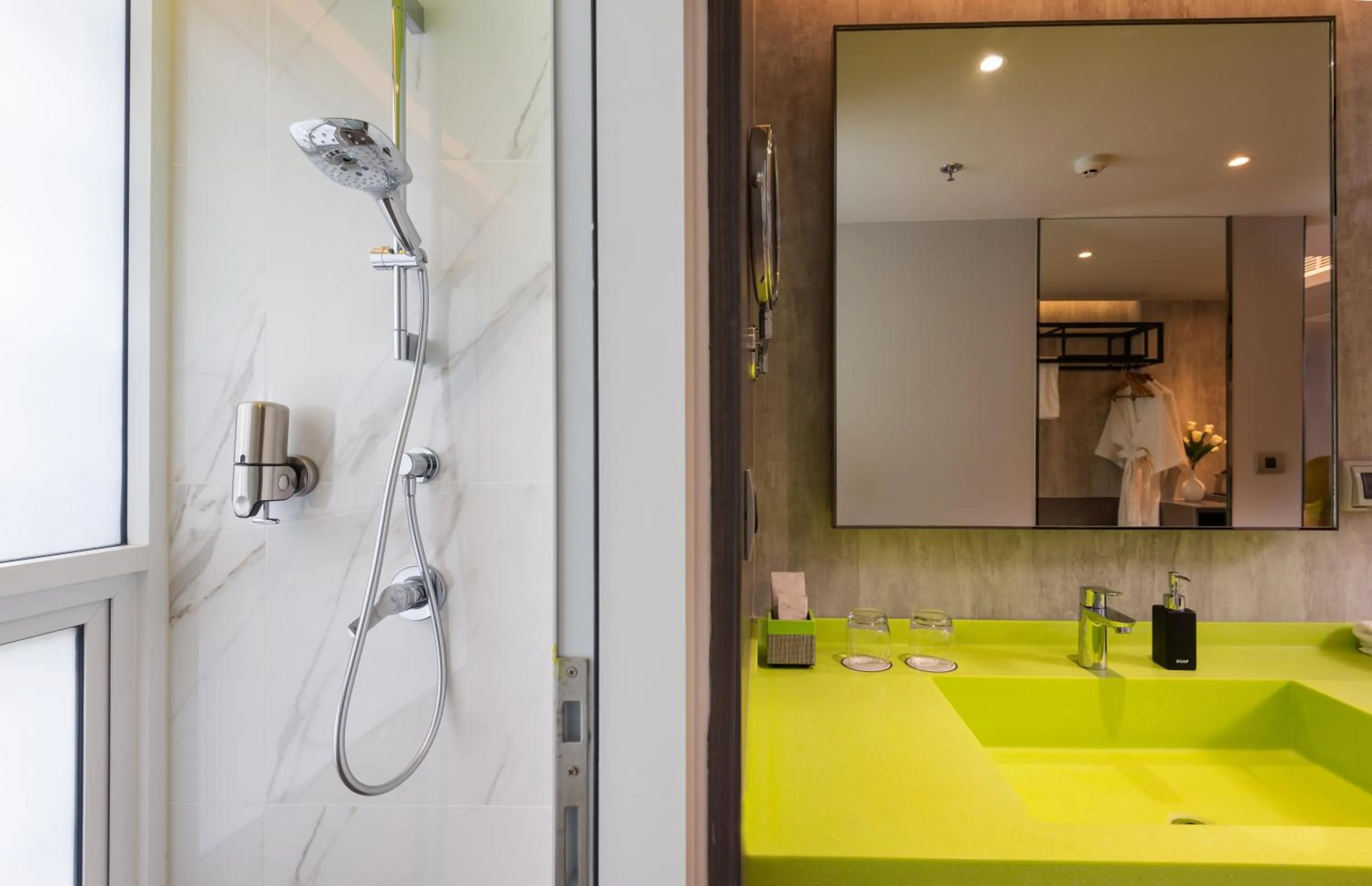 Shower in Maitria Hotel Rama 9 Bangkok - A Chatrium Collection